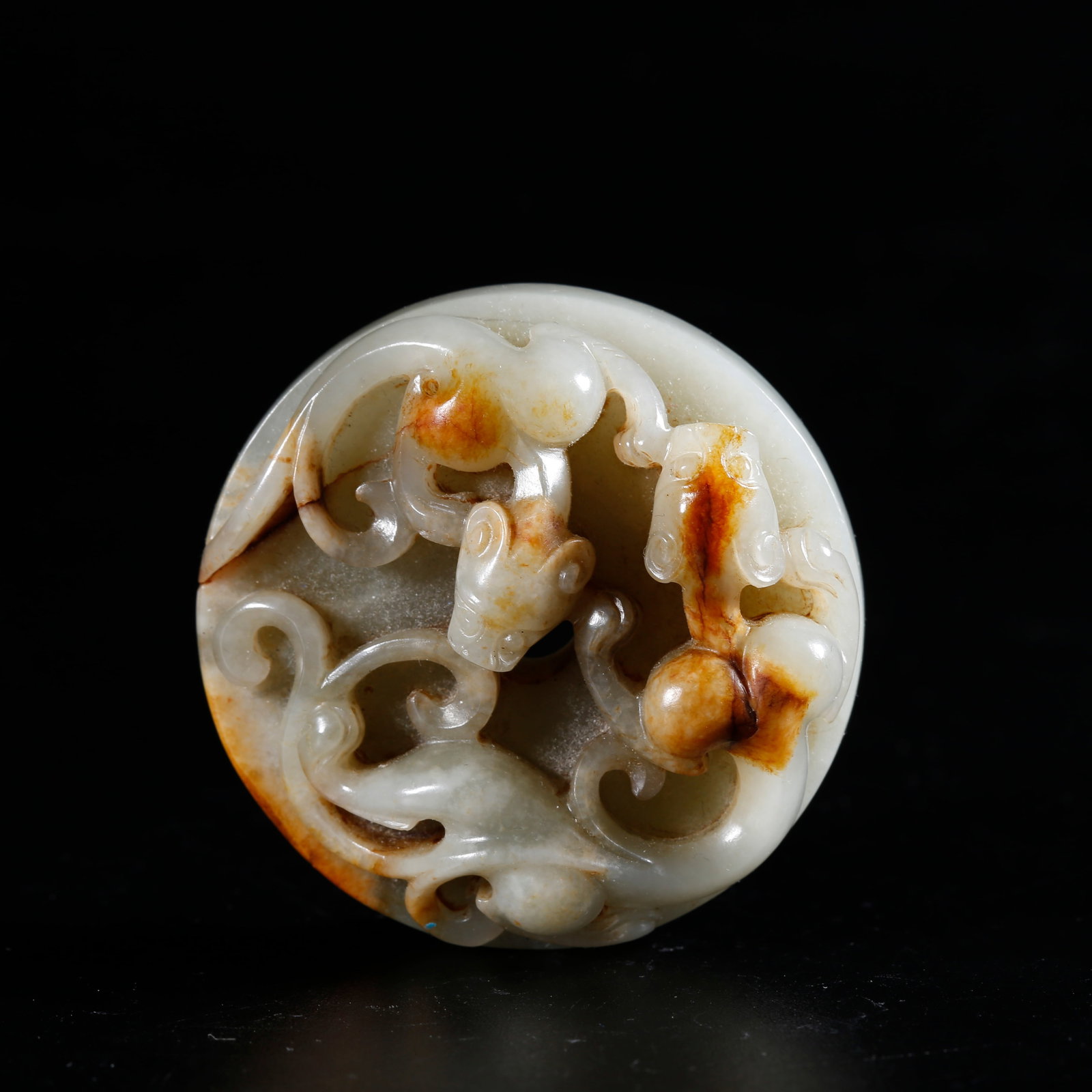 A HETIAN JADE CARVED BI DISC WITH DRAGON PATTERN: Hetian Jade Carved Bi Disc with Dragon Pattern