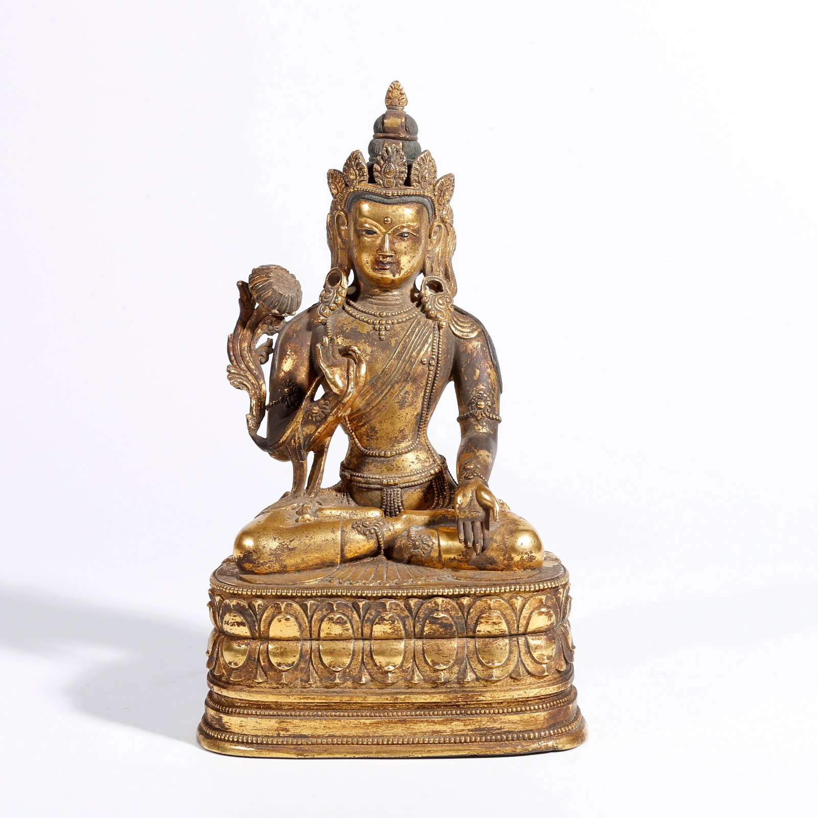 A GILT BRONZE STATUE OF PADMA HASTAVARA: Gilt Bronze Statue of Padma Hastavara