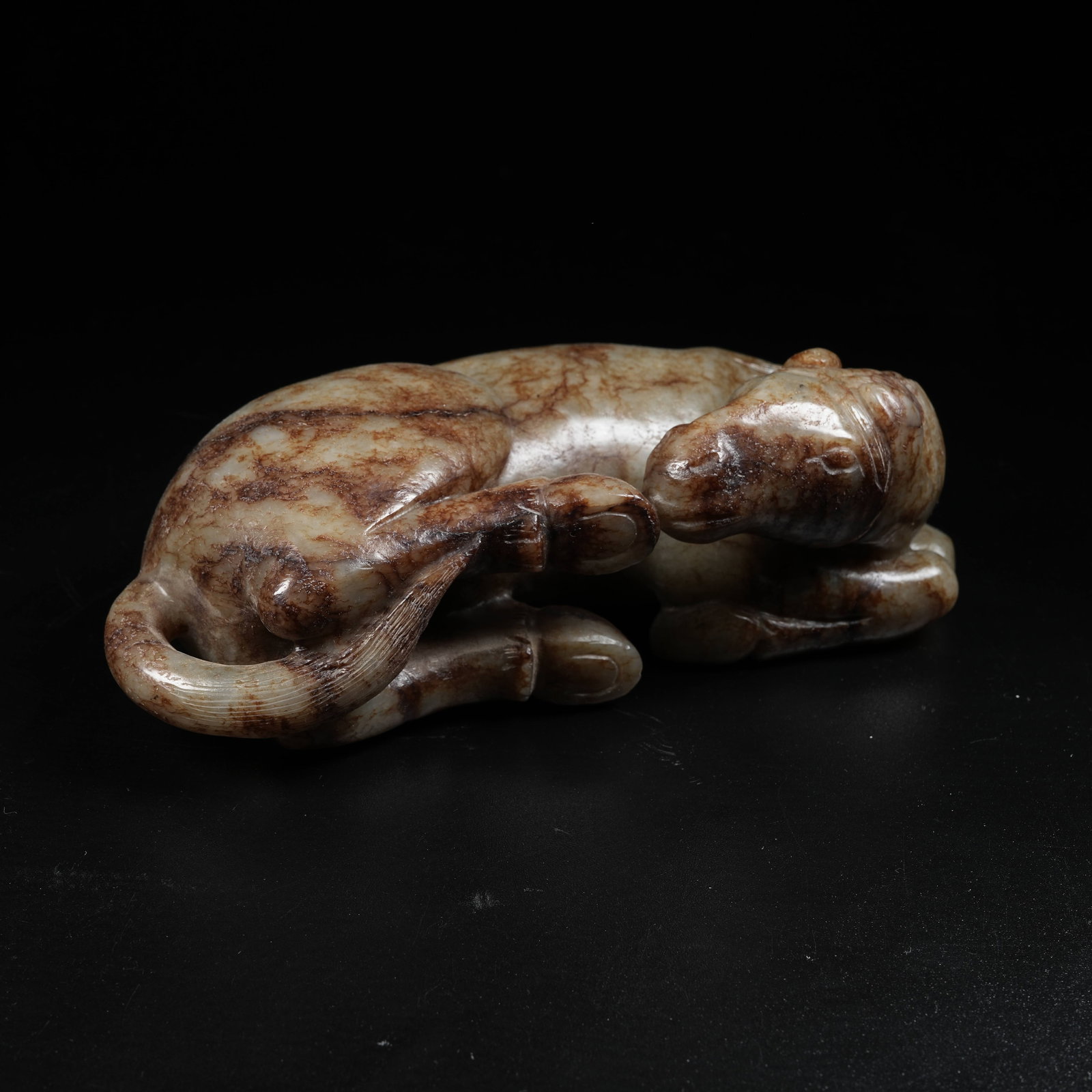 A ANCIENT JADE RECUMBENT HORSE ORNAMENT: Ancient Jade Recumbent Horse Ornament