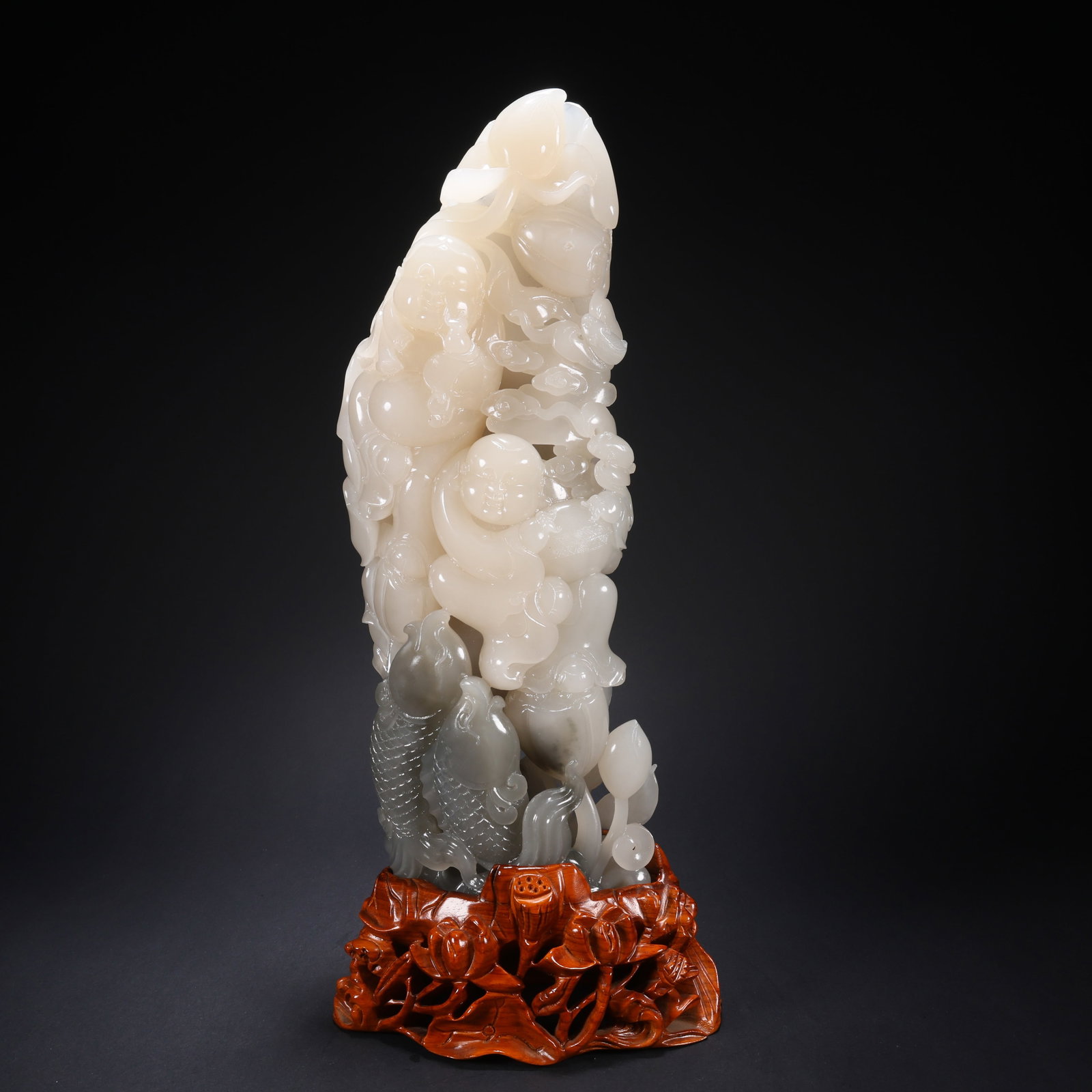 A HETIAN JADE WOODEN-BASE CARVED LOTUS WITH FISH AND TWO CHILDREN ORNAMENT (1 of 9)