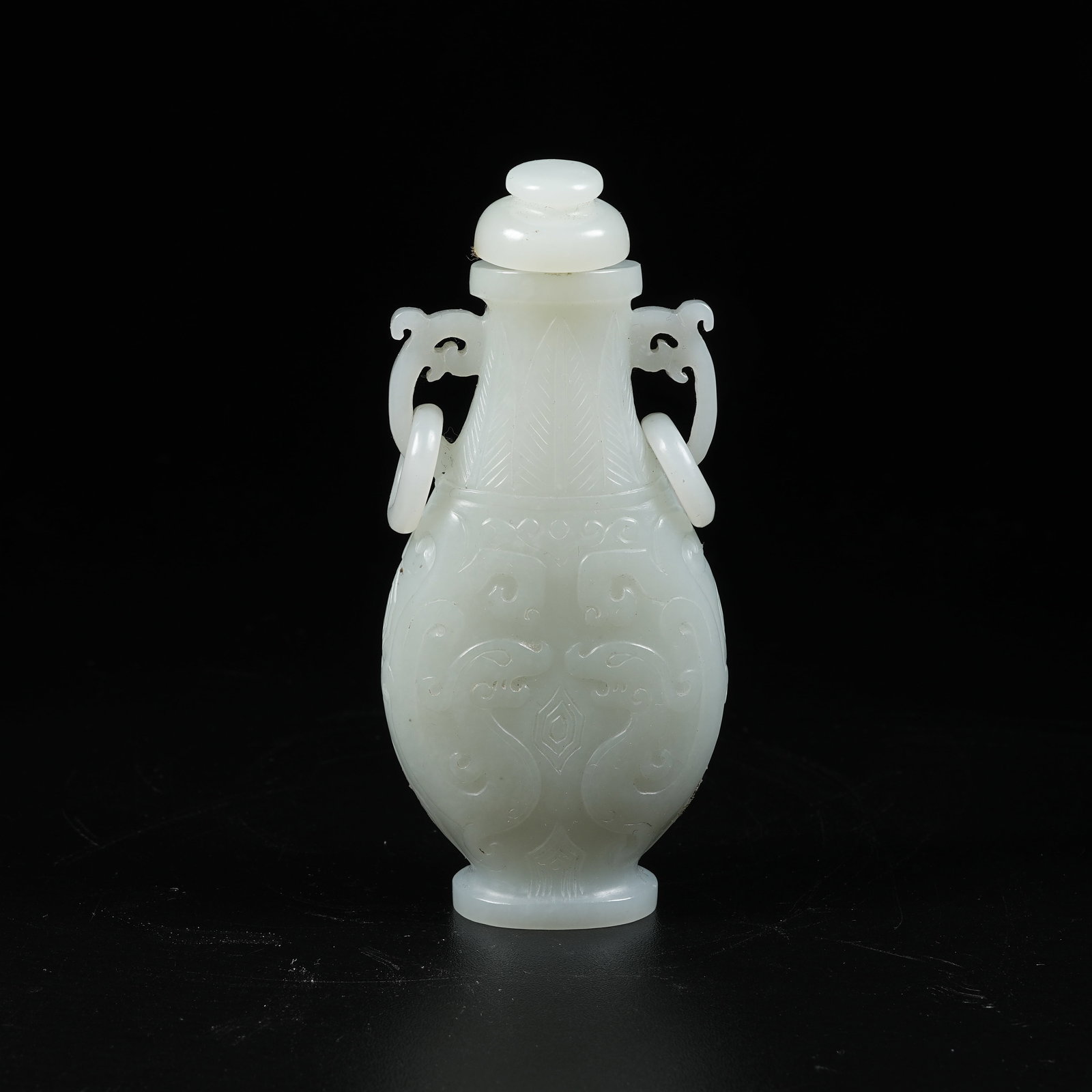 A HOTAN JADE VASE WITH CHILONG PATTERN AND MOVABLE RINGS: Hotan Jade Vase with Chilong Pattern and Movable Rings