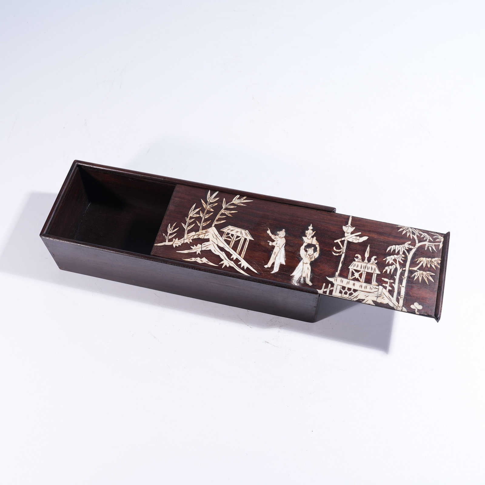 A ZITAN COVERED BOX INLAID WITH GEMS DEPICTING FIGURE NARRATIVE MOTIFS: Zitan Covered Box Inlaid with Gems Depicting Figure Narrative Motifs