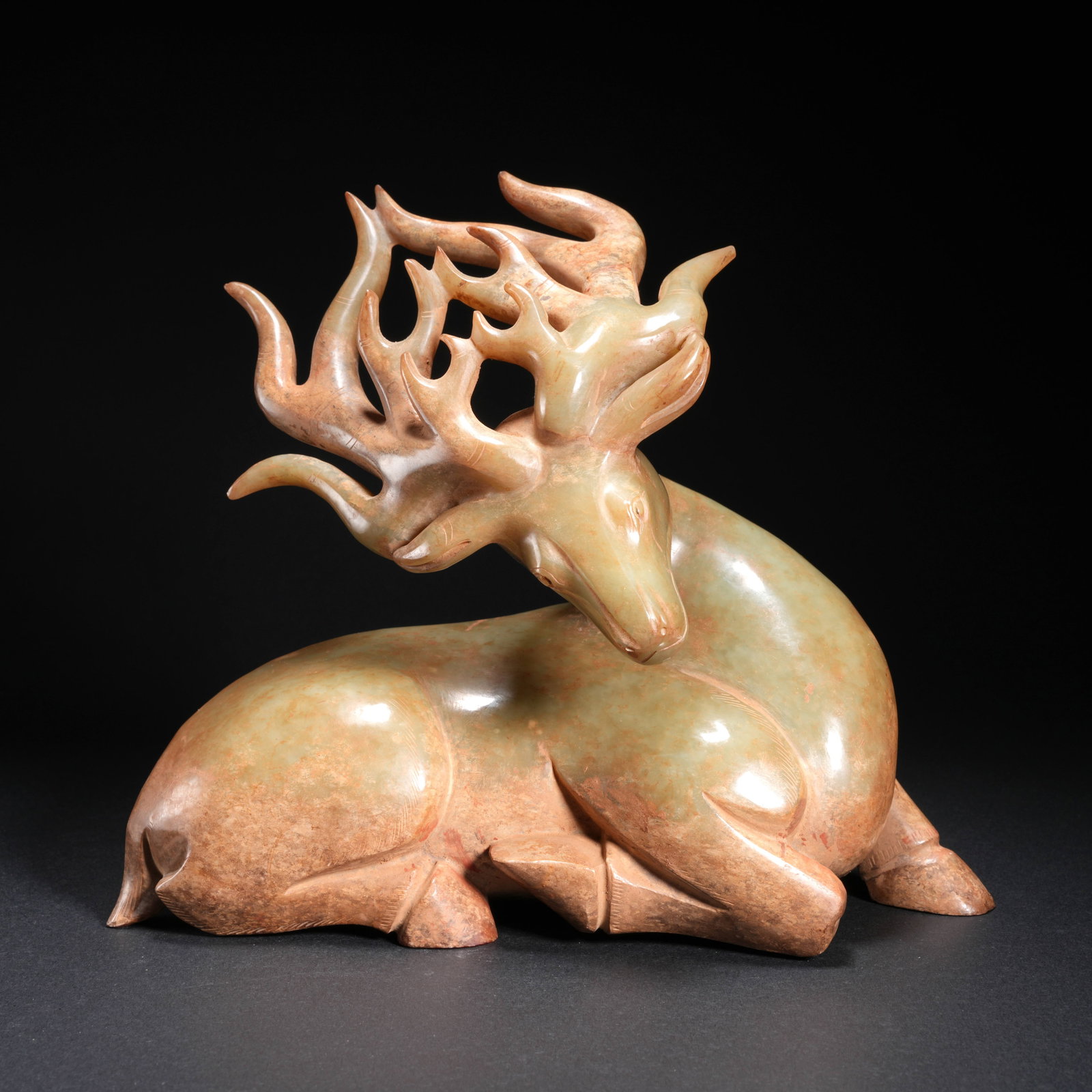 A HETIAN JADE DEER-SHAPED ORNAMENT: Hetian Jade Deer-Shaped Ornament