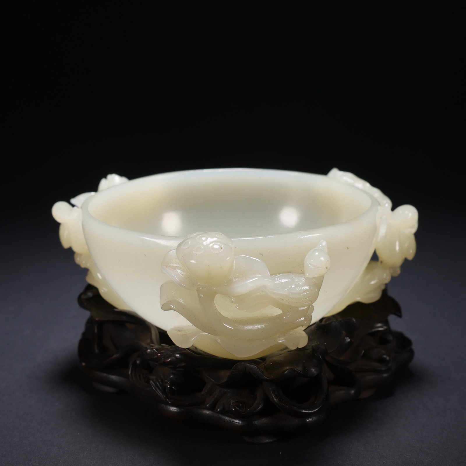 A HETIAN JADE WOODEN-BASE CRANES PLAYING WITH LOTUS BRUSH WASHER: Hetian Jade Wooden-Base Cranes Playing with Lotus Brush Washer