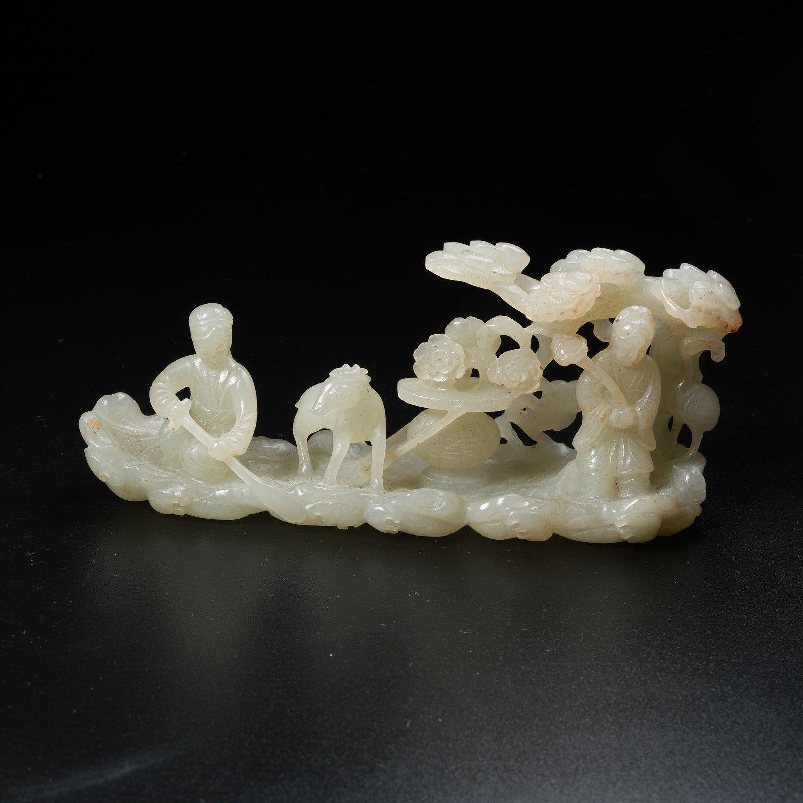 A HETIAN JADE ORNAMENT OF IMMORTAL RIDING RAFT (1 of 8)