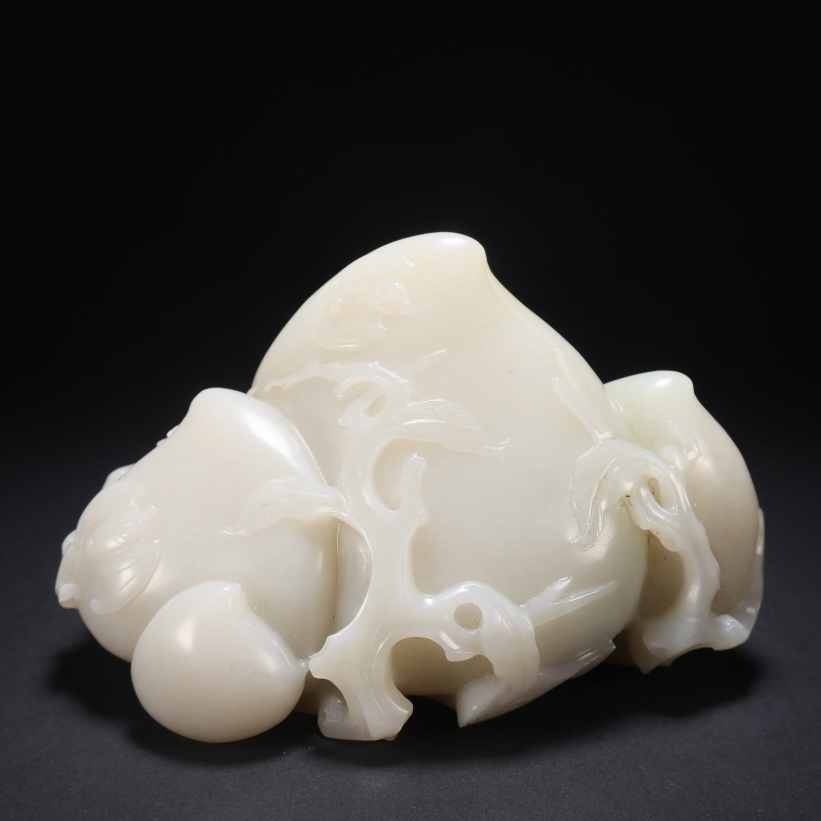 A HETIAN JADE FULL-FORTUNE AND LONGEVITY PEACH: Hetian Jade Full-Fortune and Longevity Peach