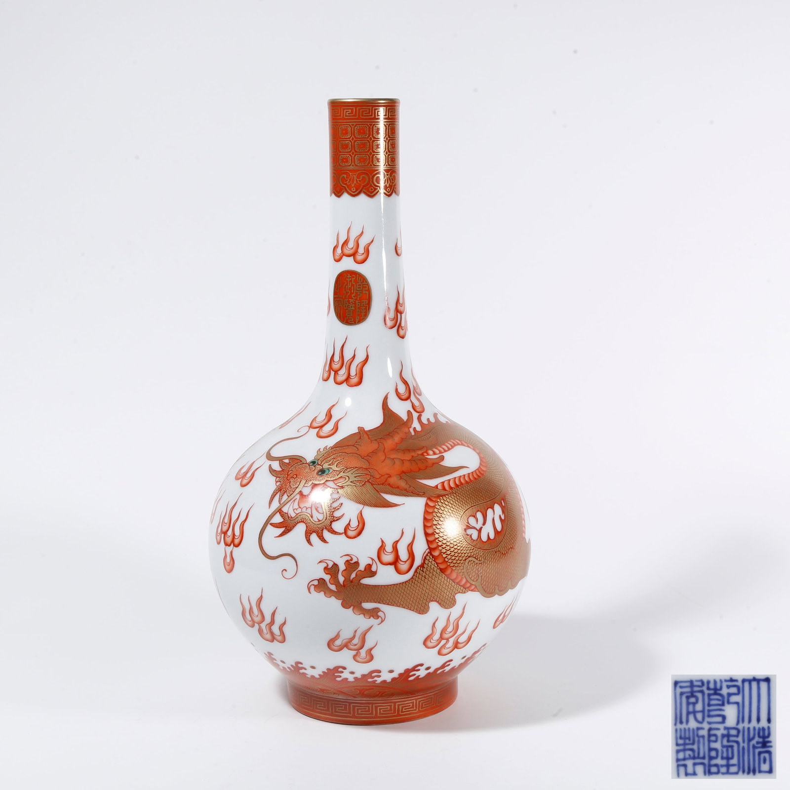 A IRON-RED GILDED LONG-NECKED VASE WITH CLOUD AND DRAGON PATTERN: Iron-red Gilded Long-necked Vase with Cloud and Dragon Pattern