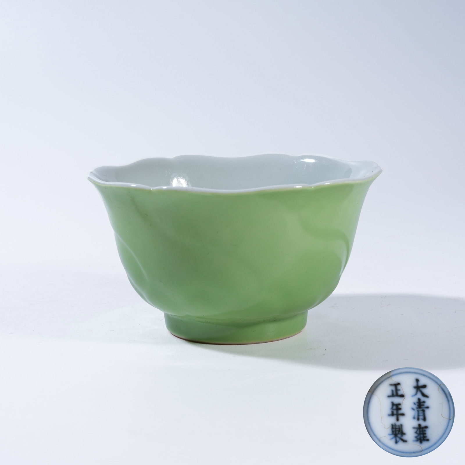 A GREEN-GLAZED LOBED-RIM CUP: Green-Glazed Lobed-Rim Cup