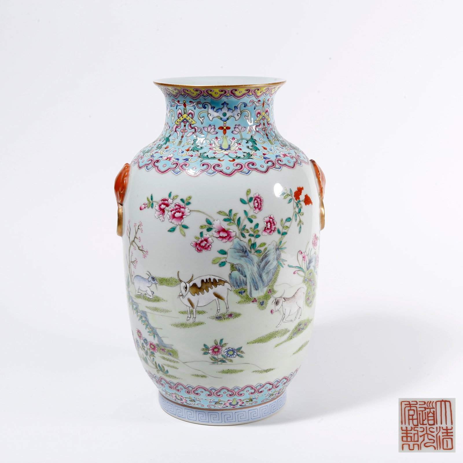 A FAMILLE ROSE LANTERN VASE WITH DOUBLE EARS AND THREE RAMS AUSPICIOUS PATTERN: Famille Rose Lantern Vase with Double Ears and Three Rams Auspicious Pattern