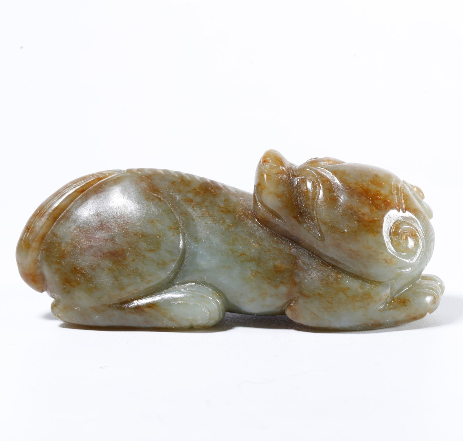 A HOTAN JADE CARVED BEAST ORNAMENT: Hotan Jade Carved Beast Ornament