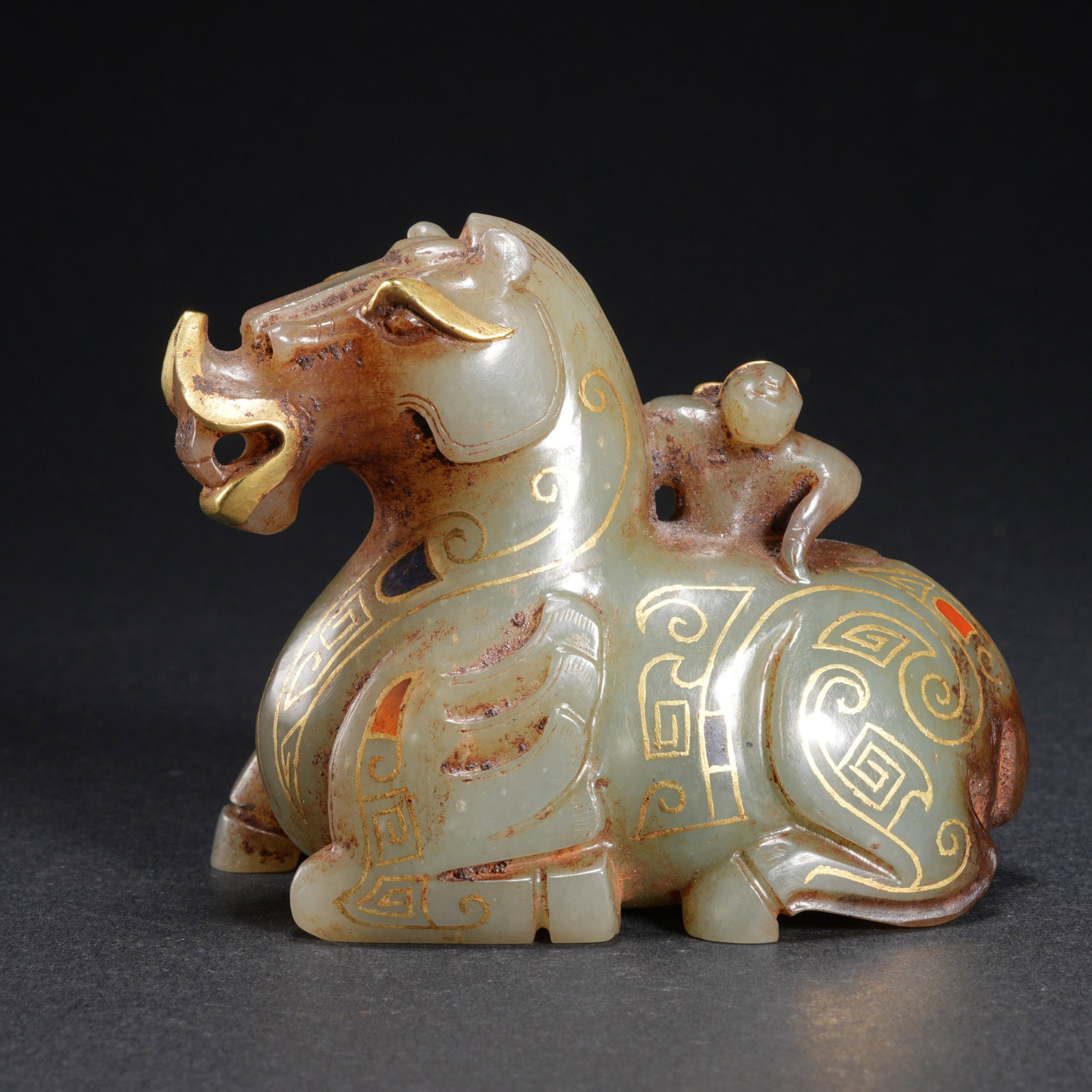 A HETIAN JADE GILT-INLAID ORNAMENT OF HORSEMAN (1 of 10)