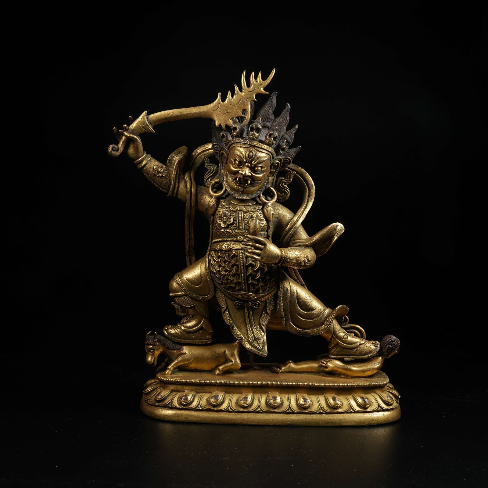 A GILT BRONZE STATUE OF RED LORD OF DESTINY: Gilt Bronze Statue of Red Lord of Destiny