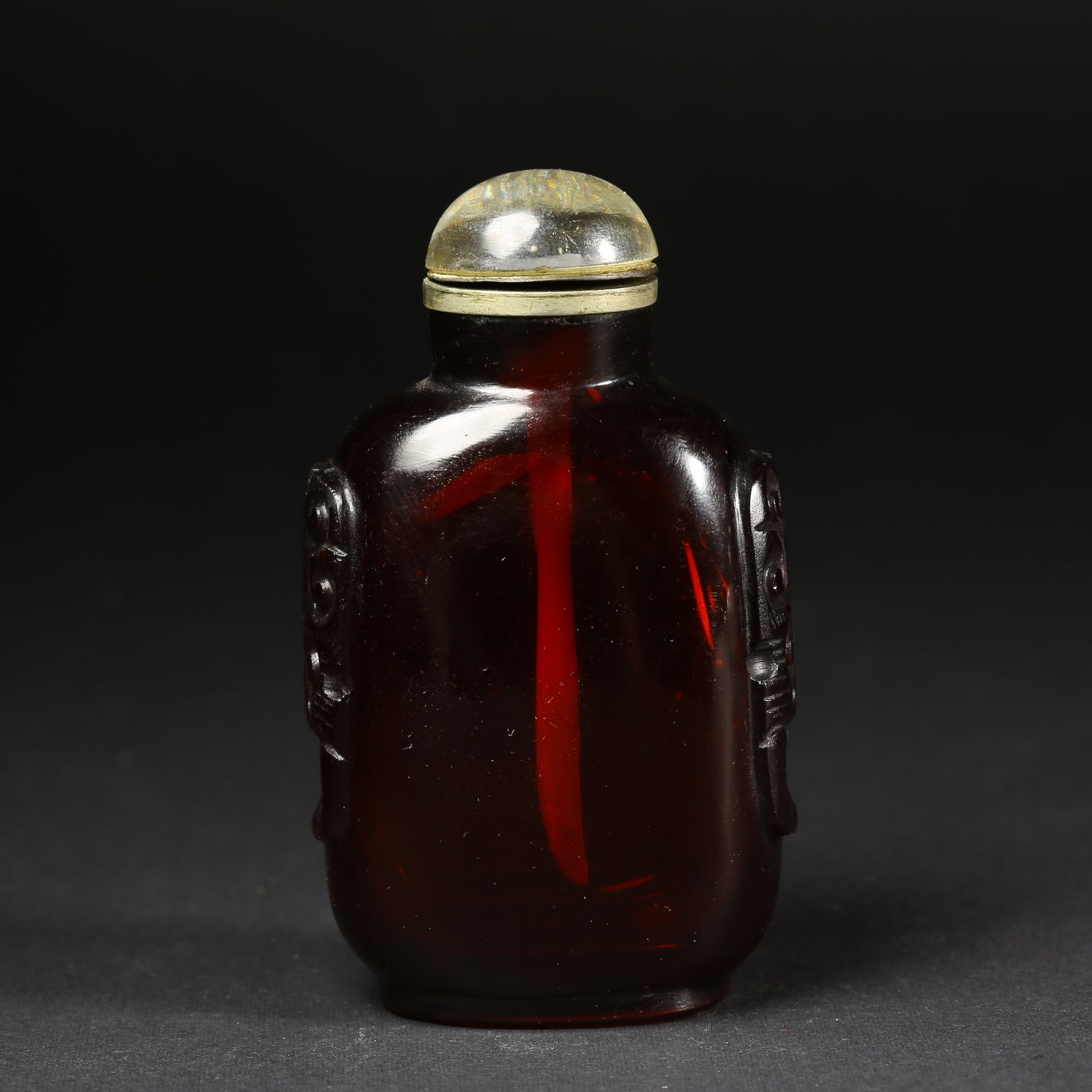 A GLASS SNUFF BOTTLE WITH HANDLES: Glass Snuff Bottle with Handles