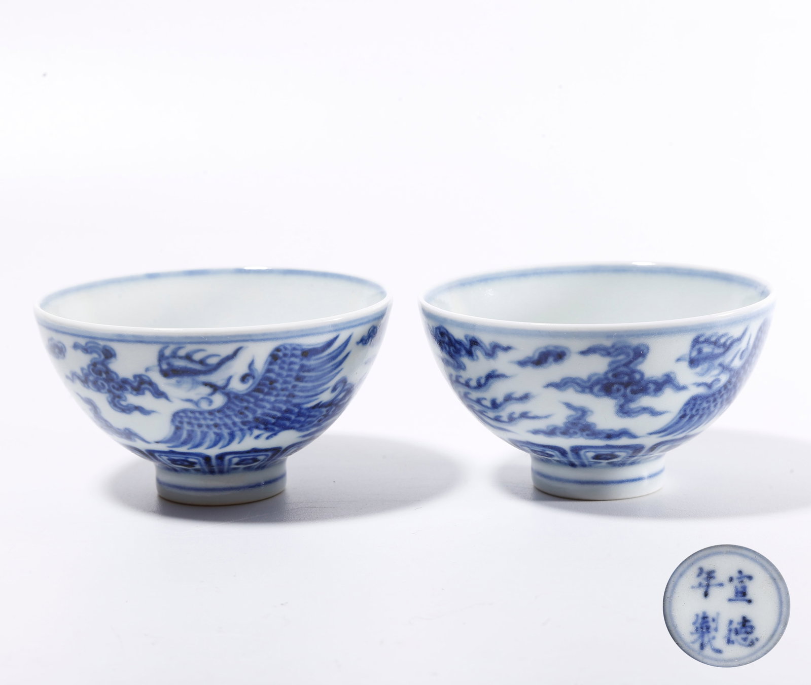 A BLUE AND WHITE CUP WITH PHOENIX PATTERN (PAIR) (1 of 9)