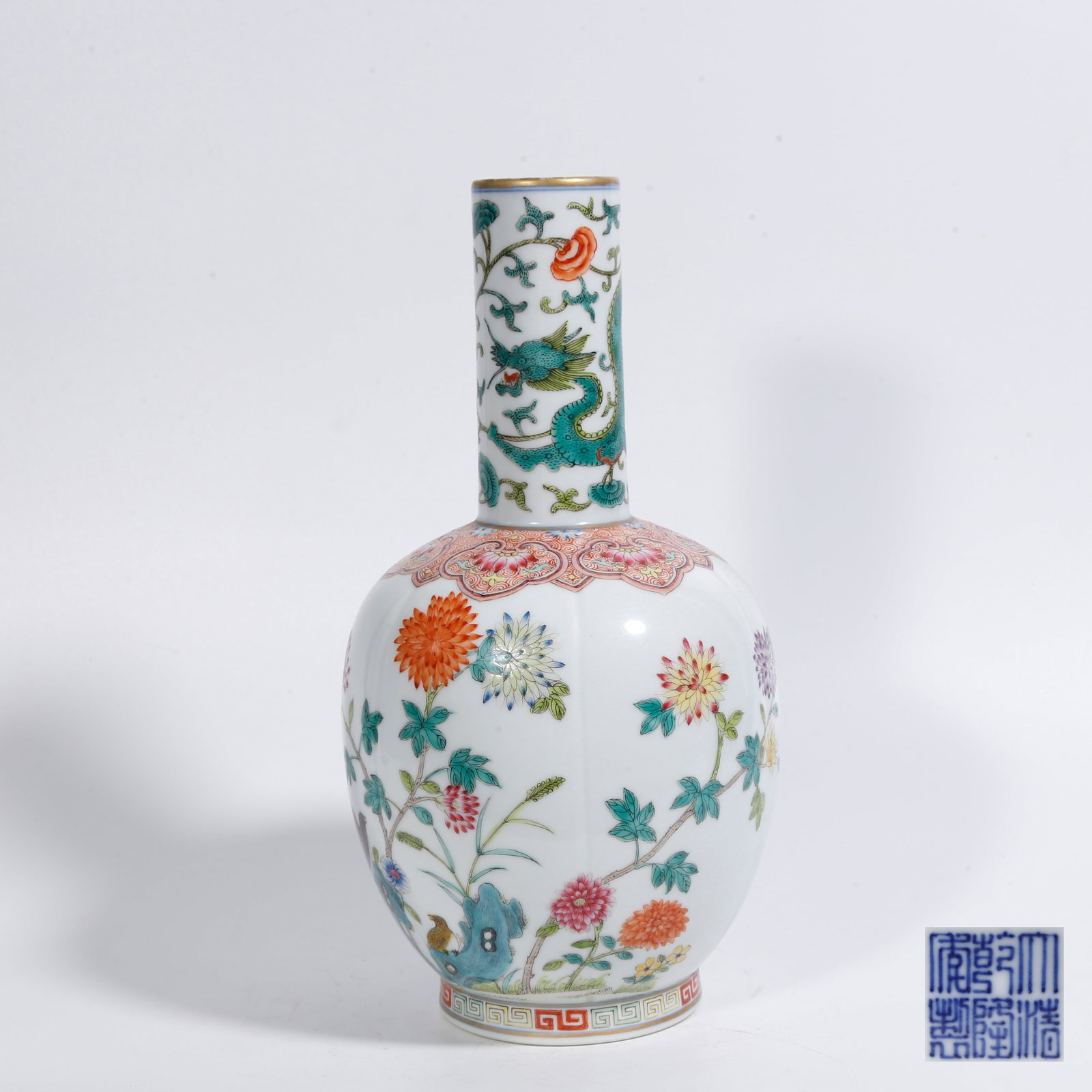 A FAMILLE-ROSE VASE WITH ROCK, FLOWER, AND BIRD MOTIFS: Famille-Rose Vase with Rock, Flower, and Bird Motifs