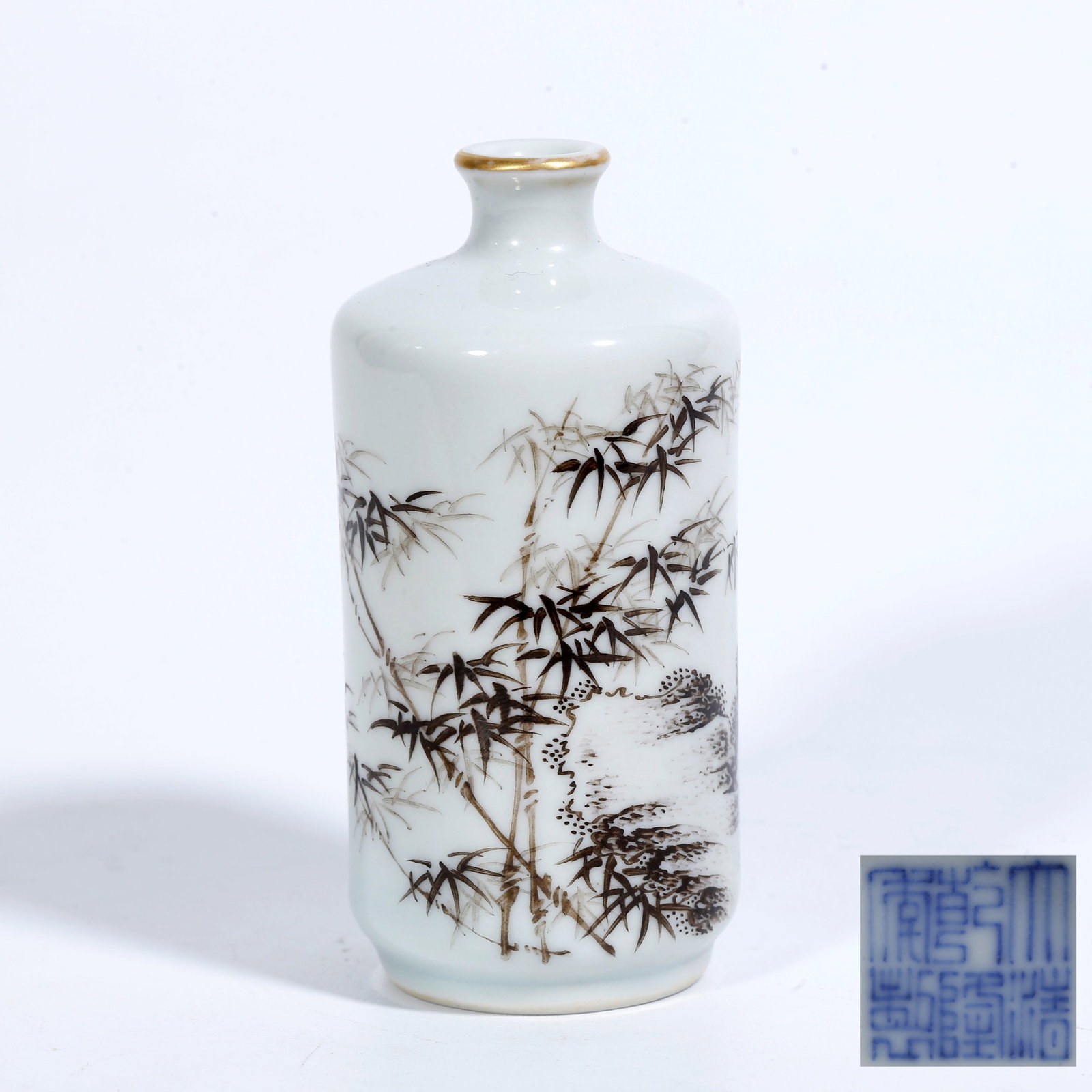 A INK-AND-COLOR SNUFF BOTTLE WITH BAMBOO AND ROCK MOTIF: Ink-and-Color Snuff Bottle with Bamboo and Rock Motif
