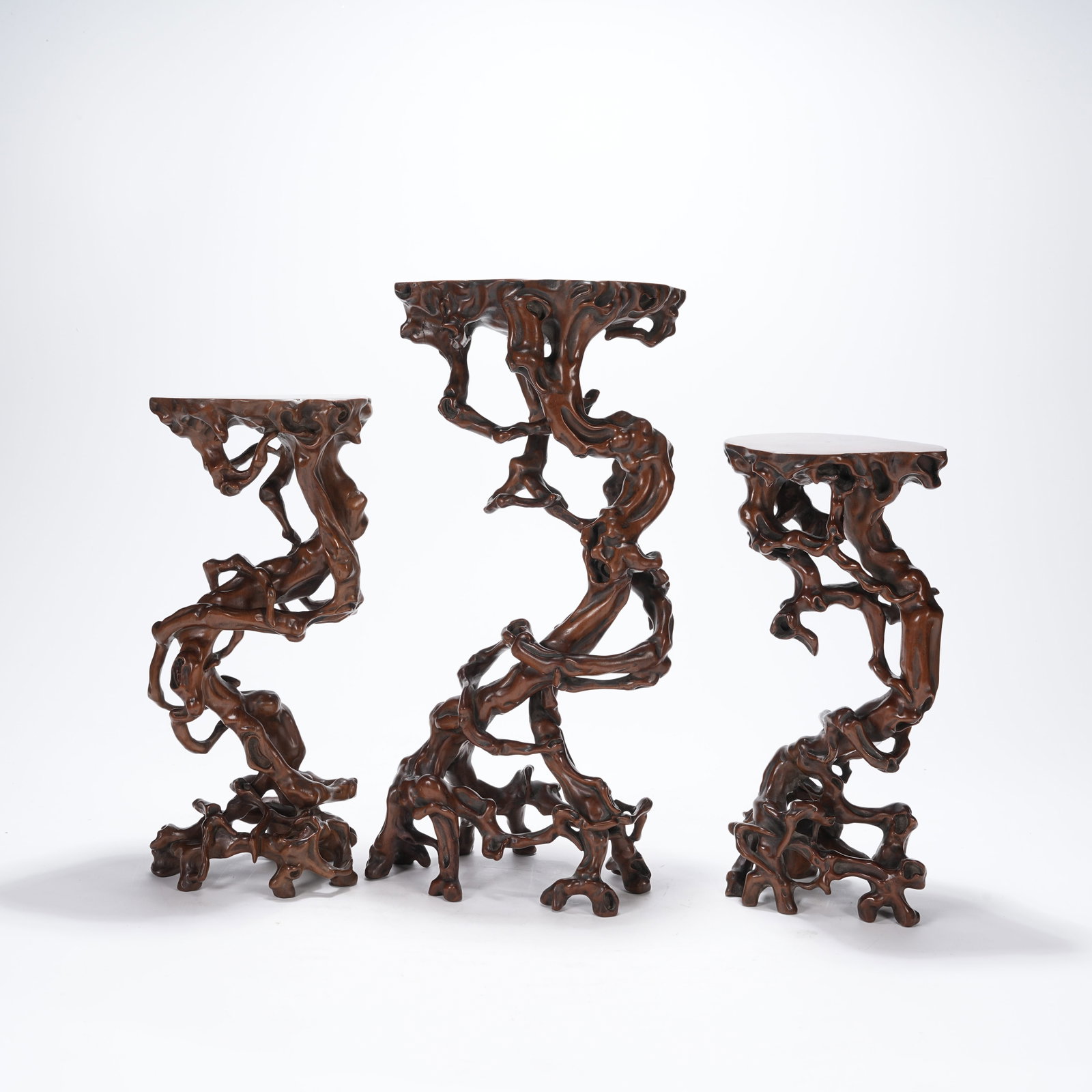 A GROUP OF BOXWOOD ROOT CARVED STANDS: Group of Boxwood Root Carved Stands