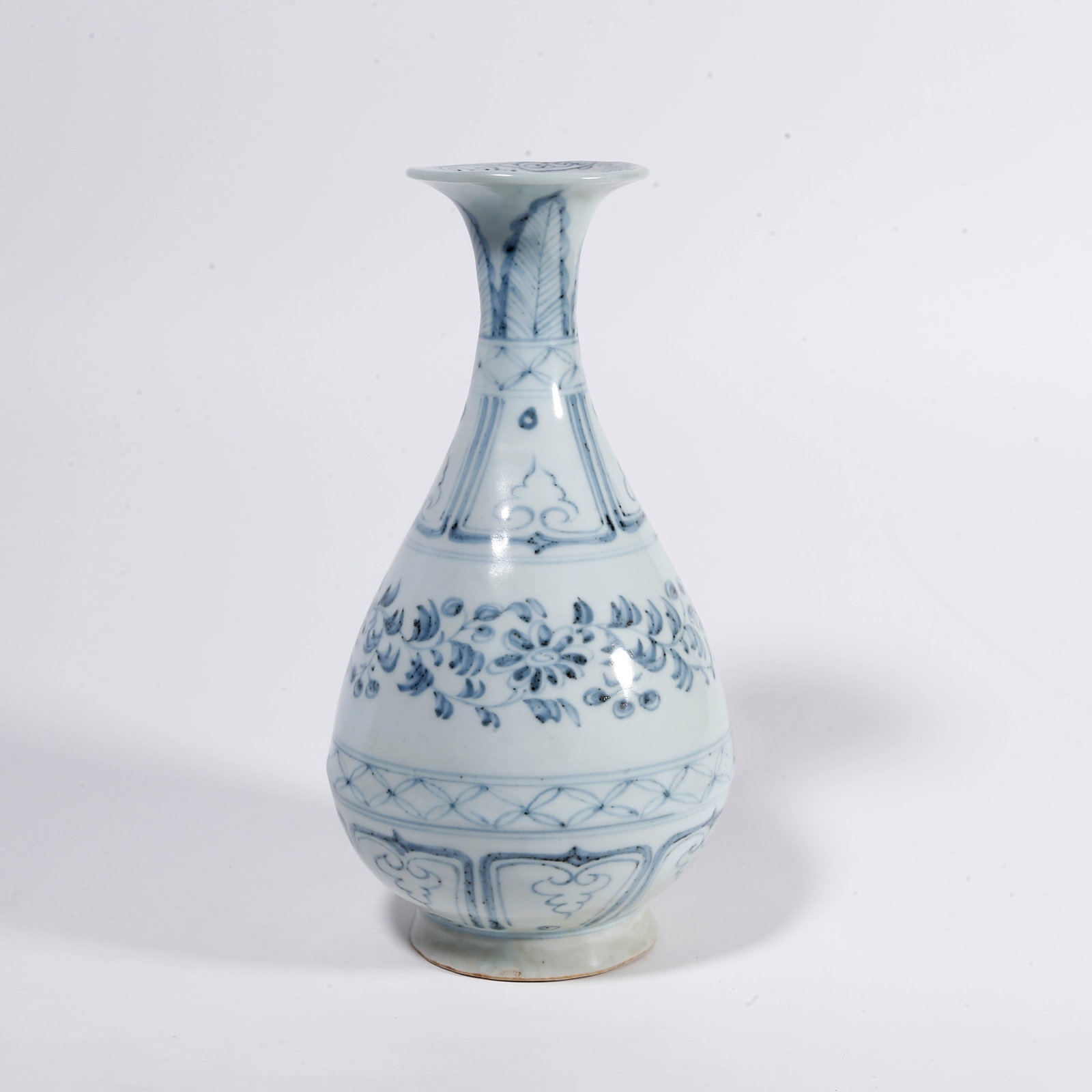 A BLUE AND WHITE PEAR-SHAPED VASE WITH INTERLOCKING FLORAL PATTERN: Blue and White Pear-shaped Vase with Interlocking Floral Pattern