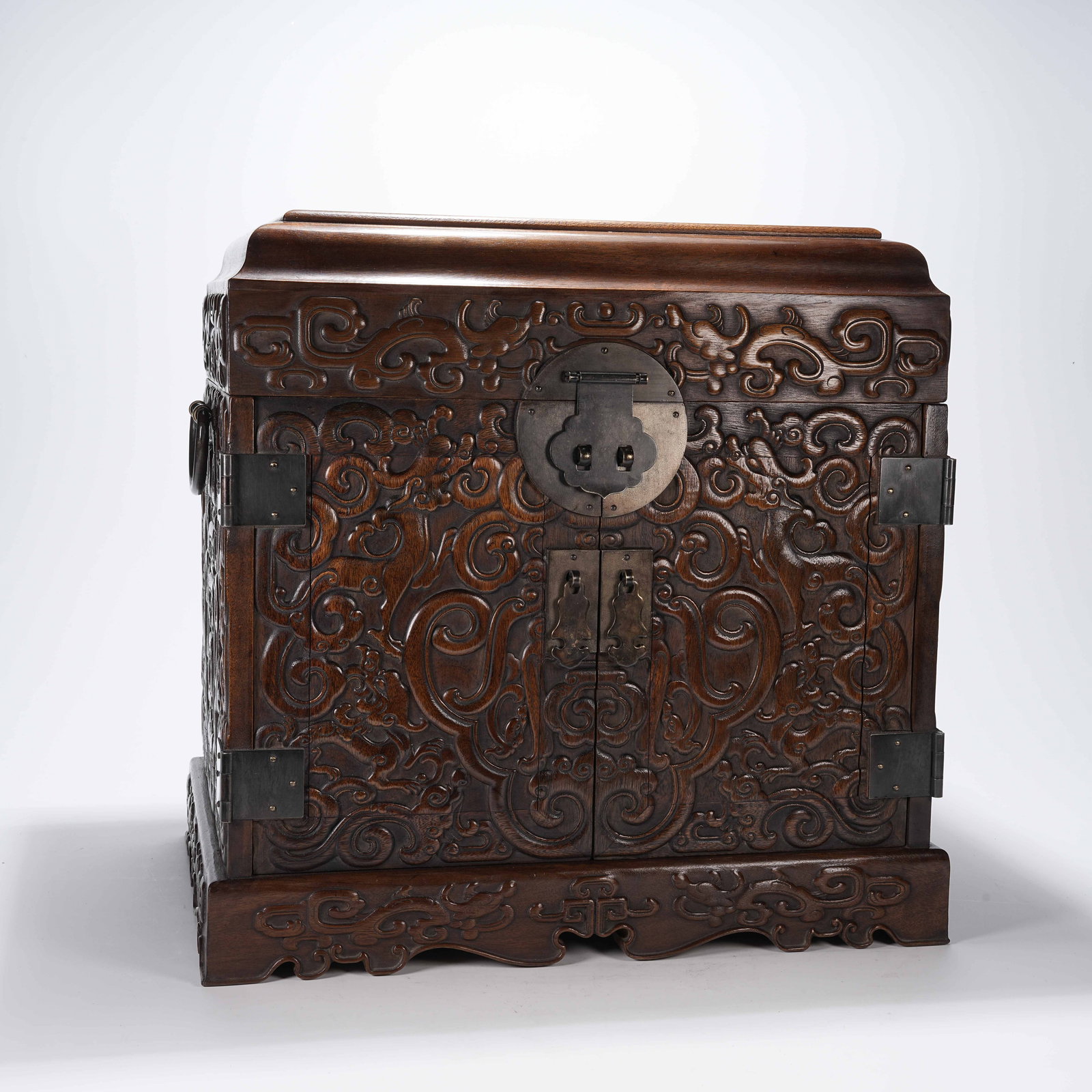 A HUANGHUALI WOOD LIDDED CHEST WITH CHILONG DRAGON PATTERN: Huanghuali Wood Lidded Chest with Chilong Dragon Pattern