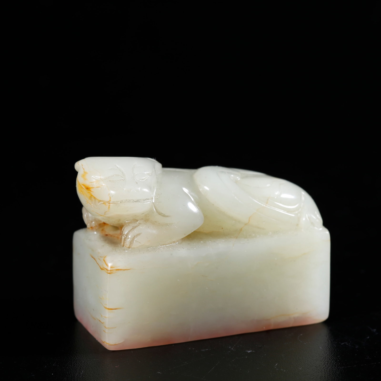 A HETIAN JADE CARVED SEAL WITH BEAST KNOB: Hetian Jade Carved Seal with Beast Knob