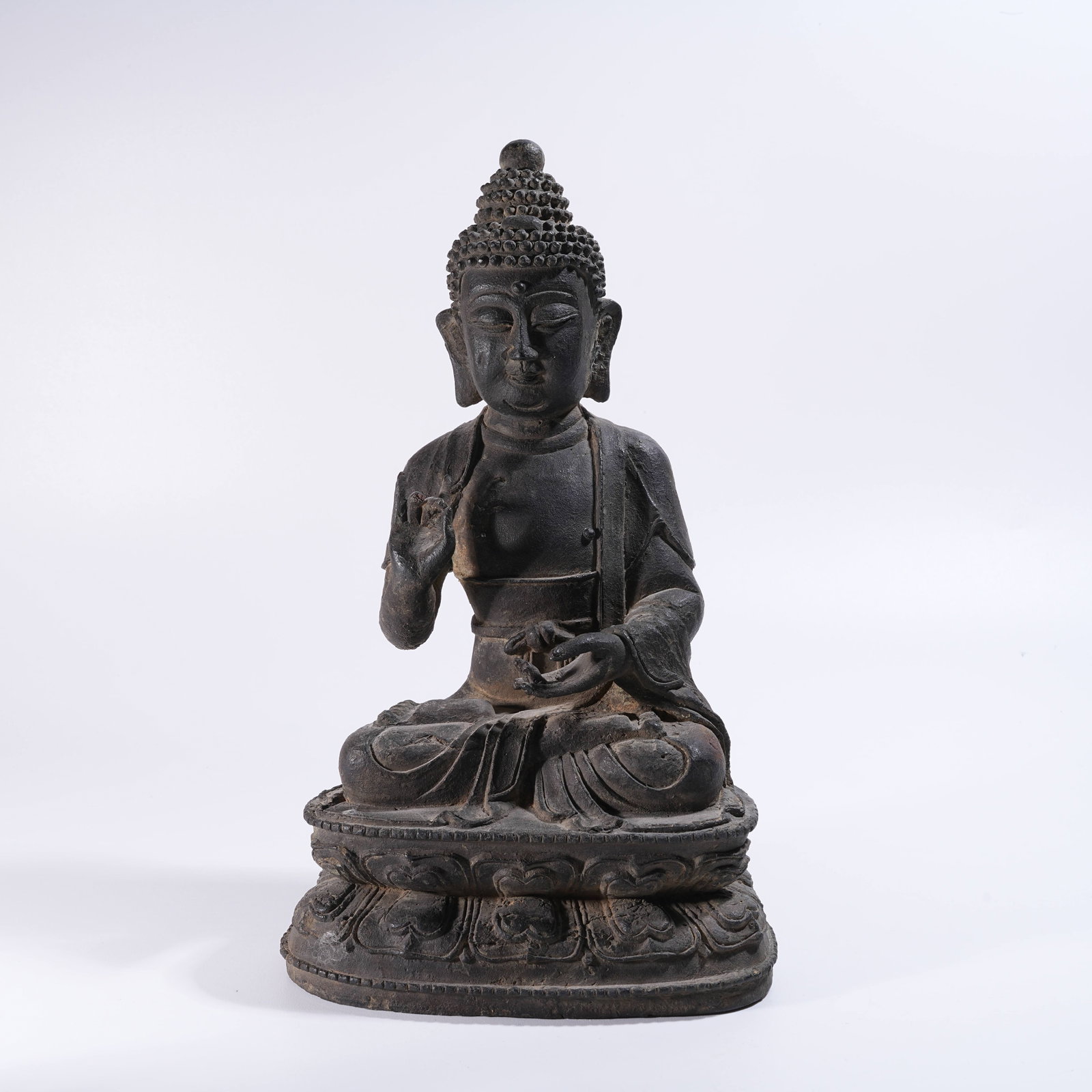A BRONZE SEATED SHAKYAMUNI BUDDHA: Bronze Seated Shakyamuni Buddha