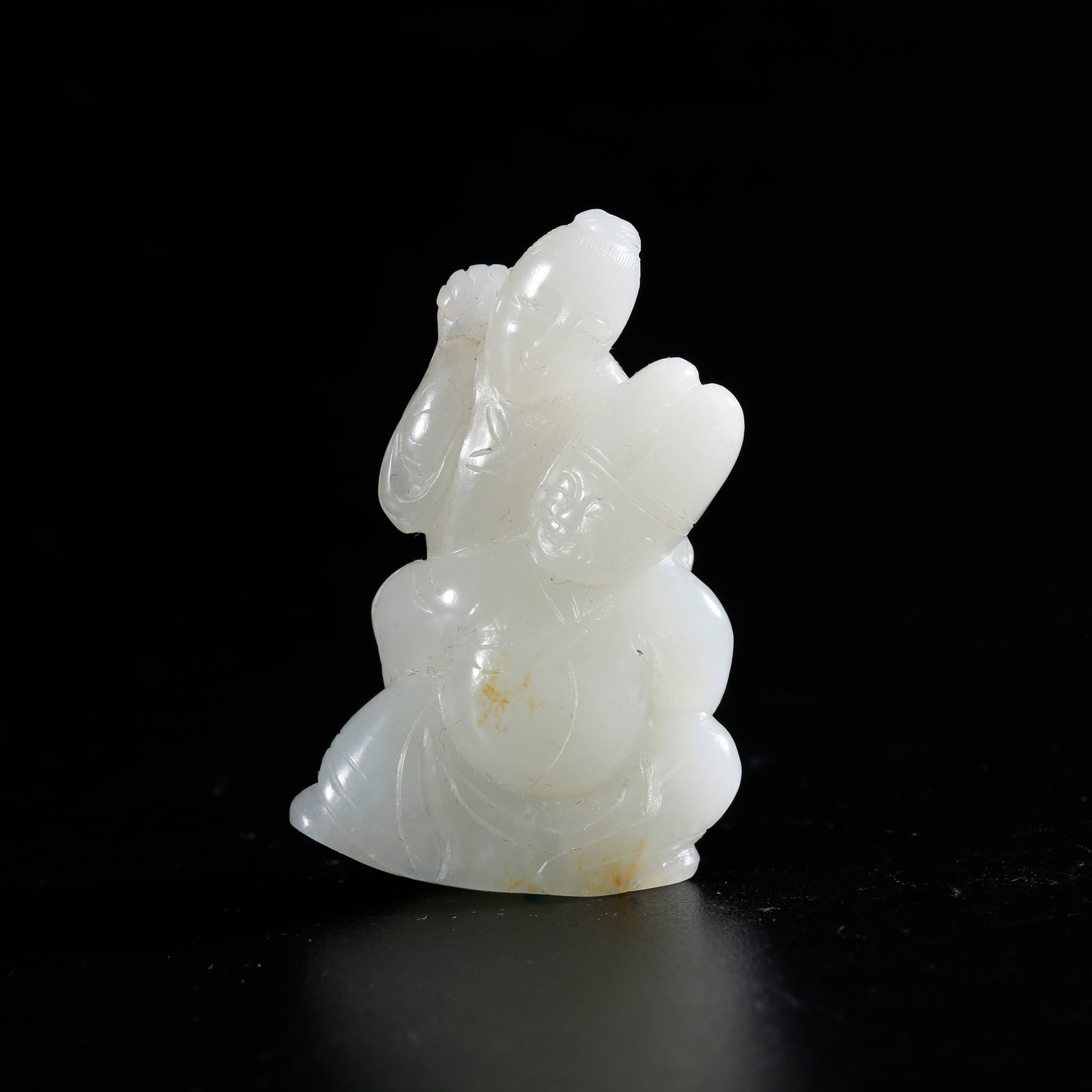 A HETIAN JADE CARVED FIGURE-SHAPED ORNAMENT (1 of 9)