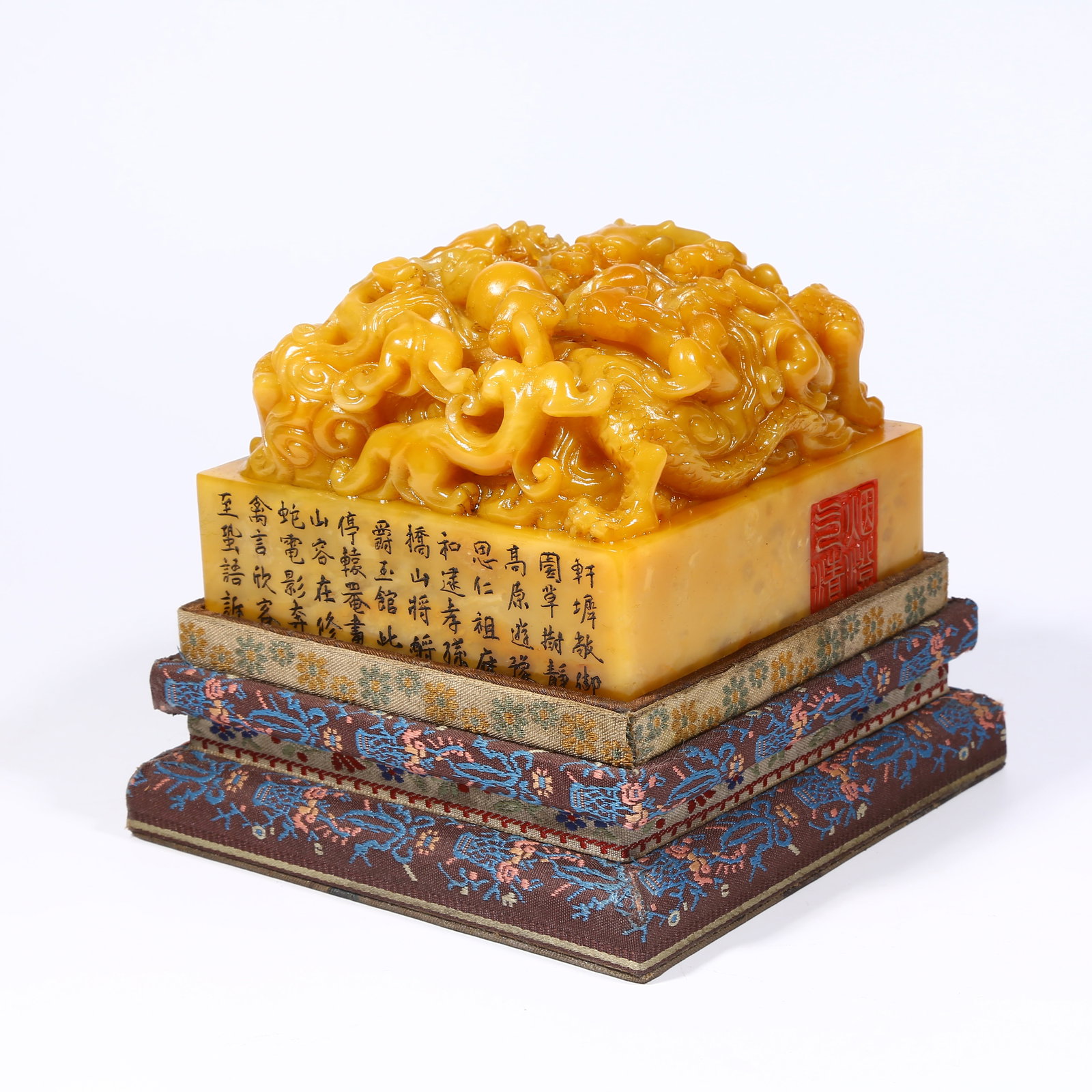A SHOUSHAN TIANHUANG STONE SEAL WITH DRAGON KNOB: Shoushan Tianhuang stone seal with dragon knob