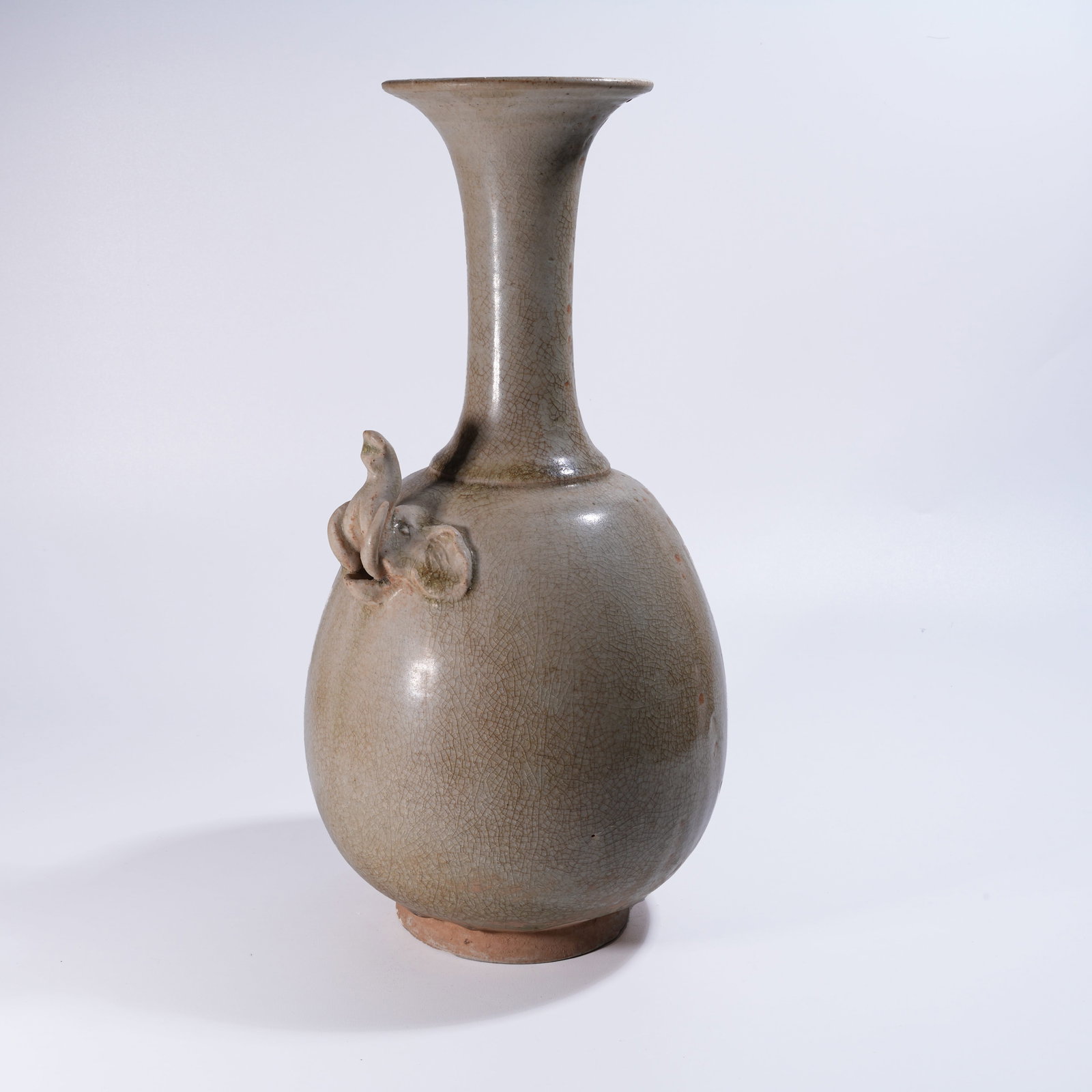 A WHITE-GLAZED BOTTLE WITH FLARED MOUTH AND ELEPHANT-HEAD DECORATION (1 of 10)