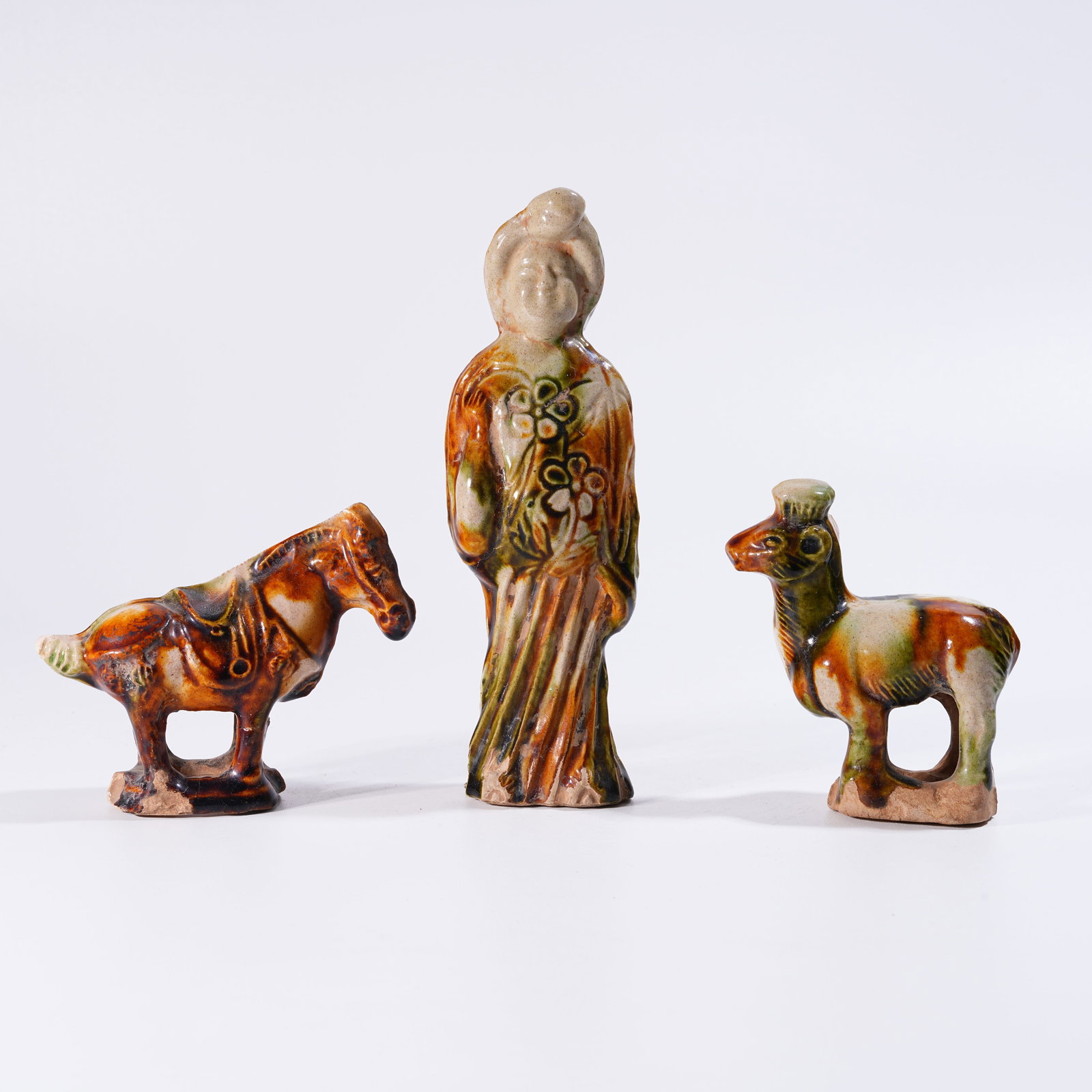 A SET OF TANG SANCAI FIGURINES (1 of 9)