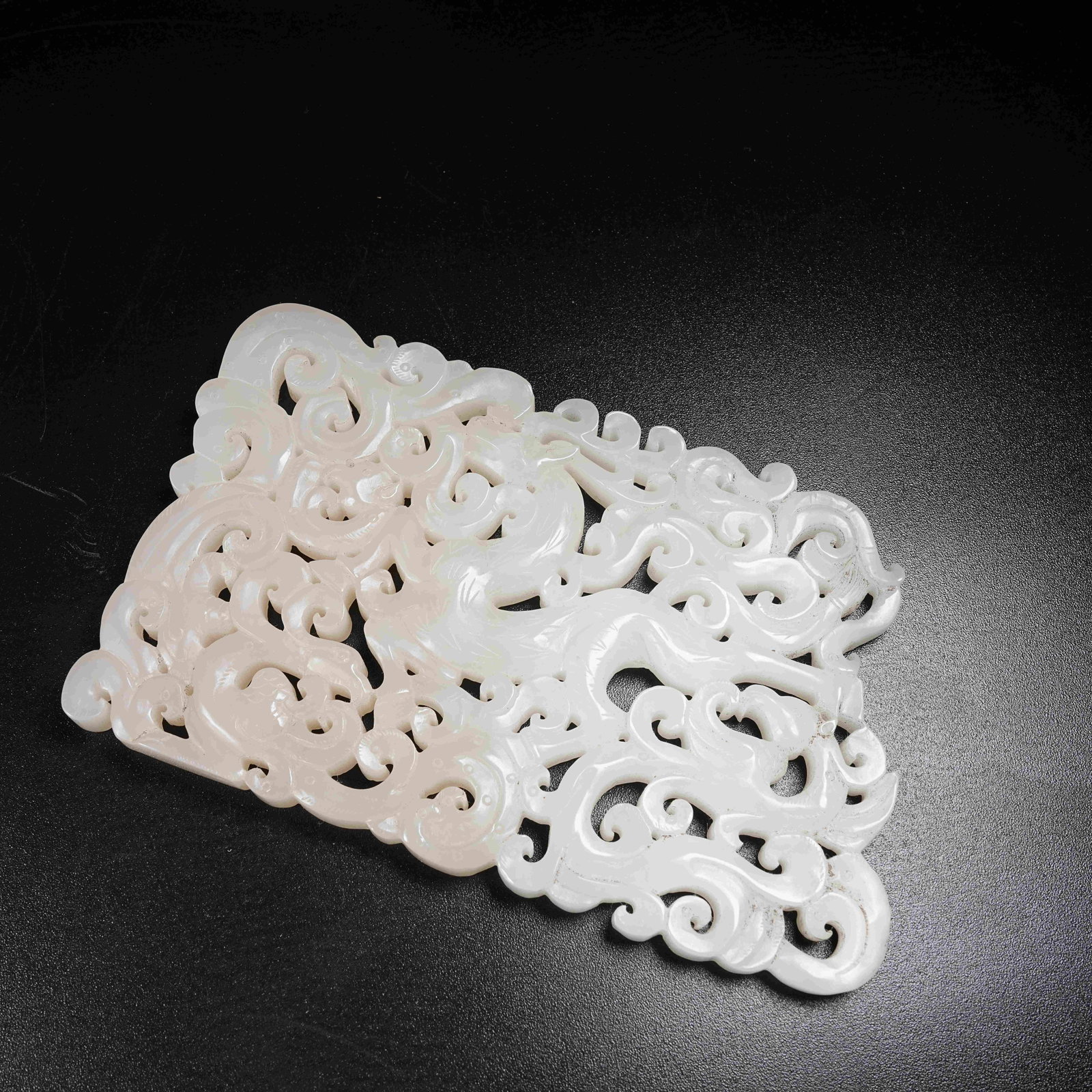 A HOTAN JADE PENDANT ORNAMENT WITH DRAGON AND PHOENIX PATTERN: Hotan Jade Pendant Ornament with Dragon and Phoenix Pattern
