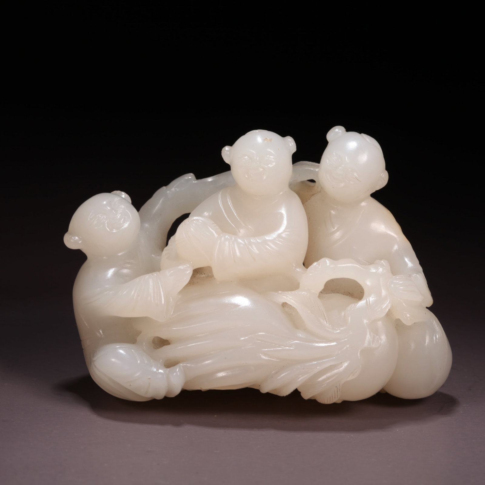 A HETIAN WHITE JADE "MANY CHILDREN, MUCH BLESSING" ORNAMENT: Hetian White Jade "Many Children, Much Blessing" Ornament
