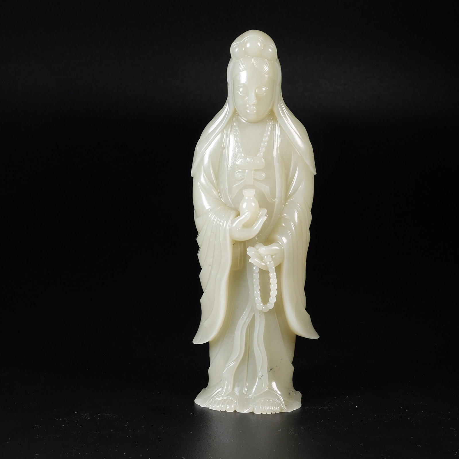 A HETIAN JADE STANDING GUANYIN FIGURE (1 of 9)