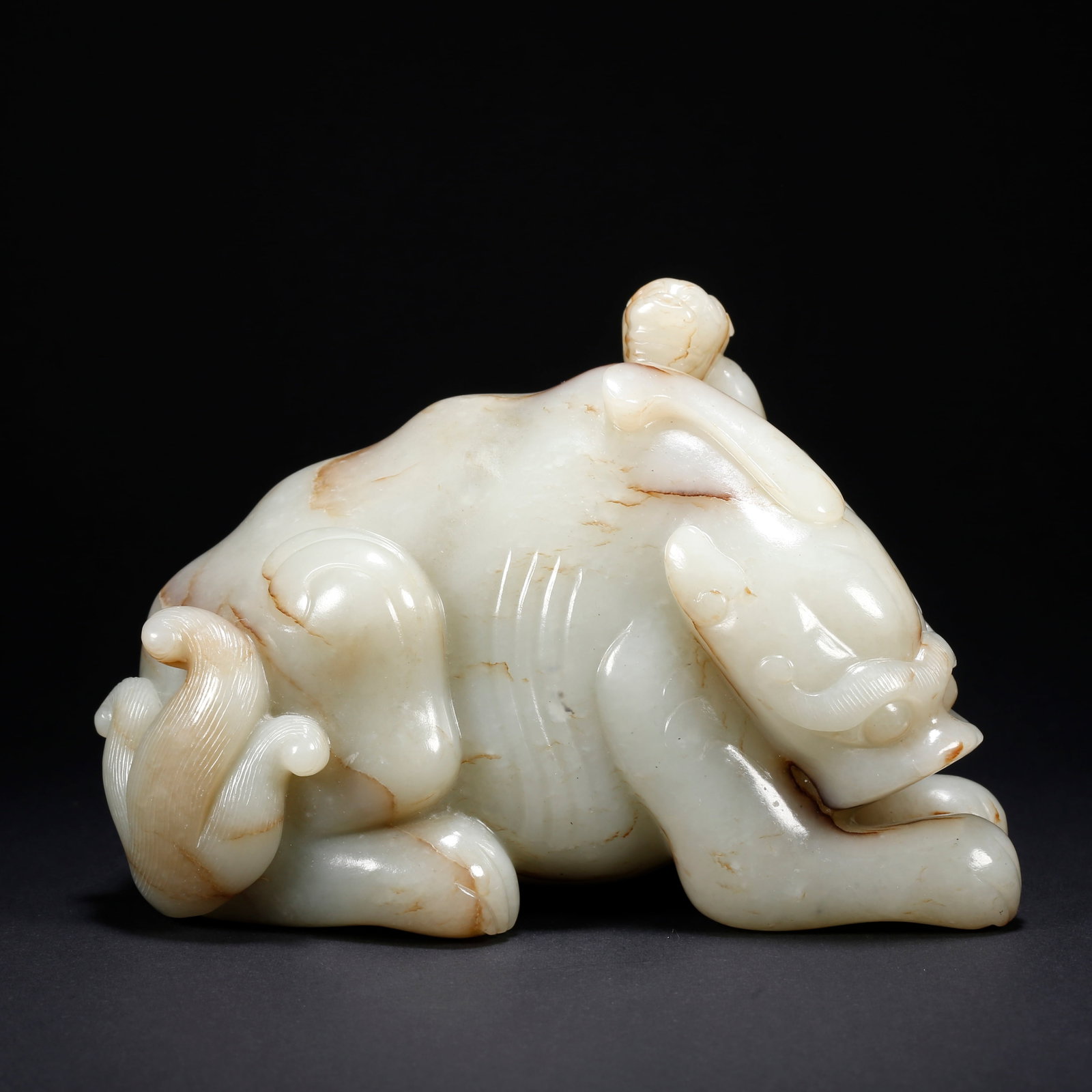 A HETIAN JADE ADULT AND CUB LION FIGURINE (1 of 9)