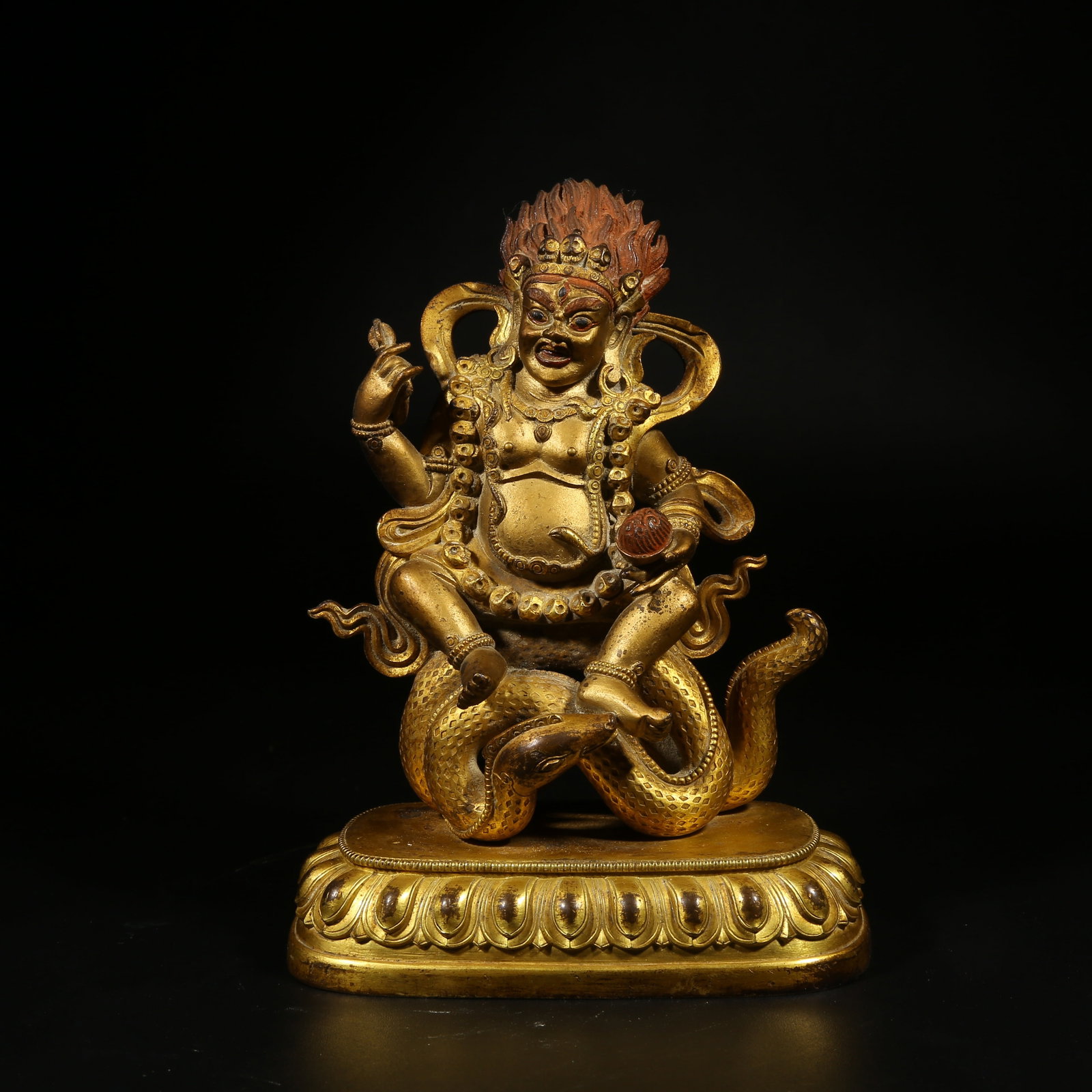 A GILT-BRONZE STATUE OF WHITE JAMBHALA: Gilt-Bronze Statue of White Jambhala