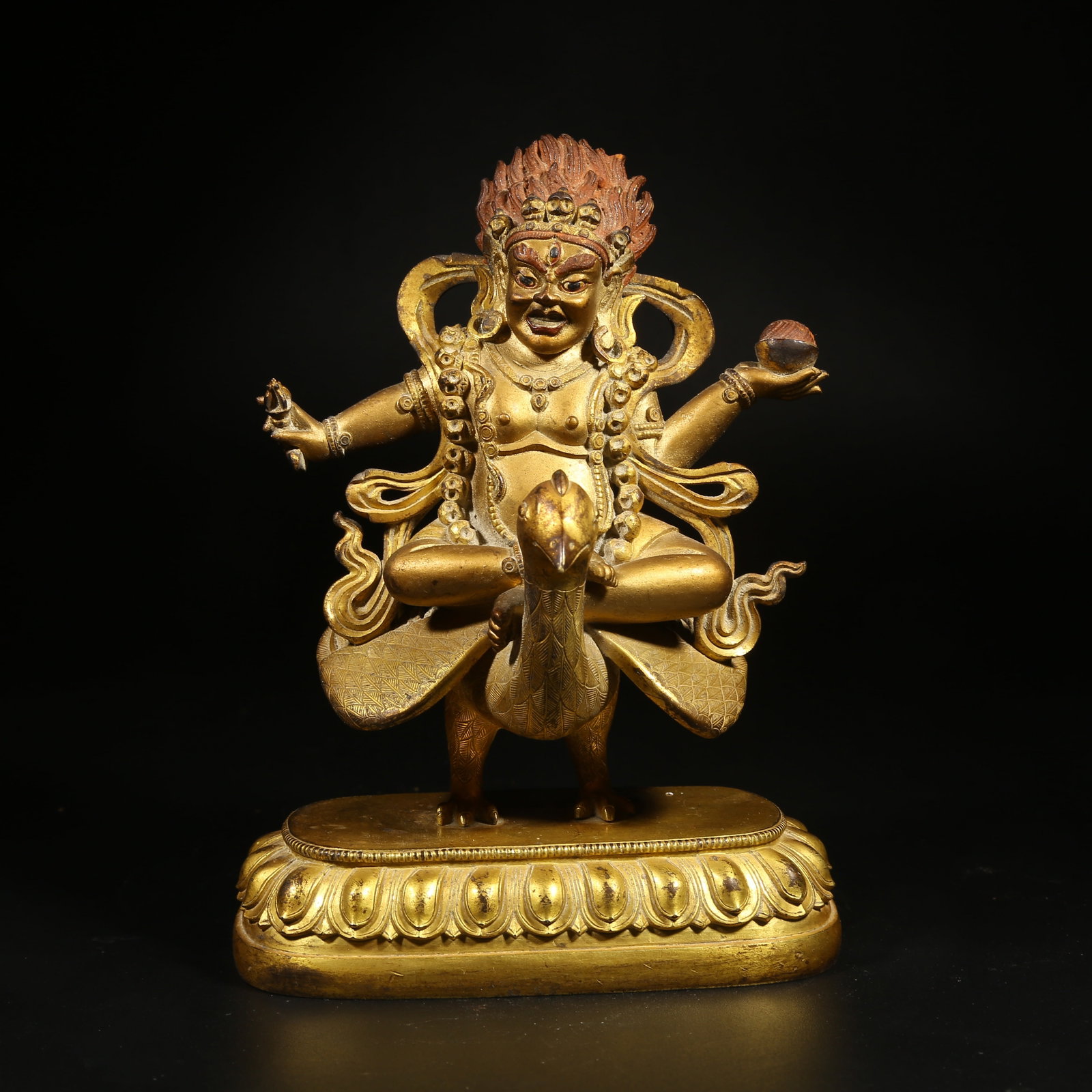 A GILT-BRONZE STATUE OF MAHAMAYURI (PEACOCK MOTHER) (1 of 8)