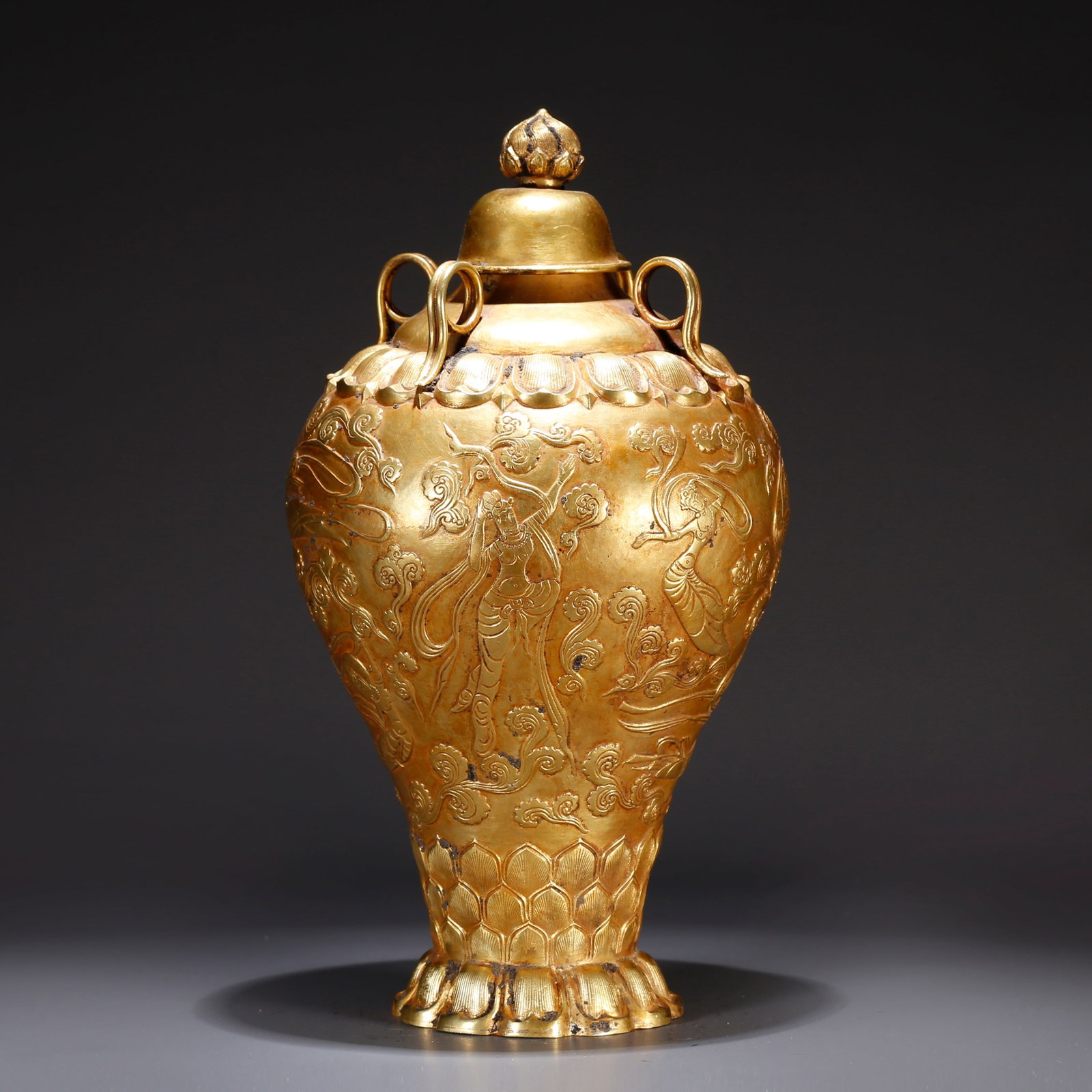 A GILT BRONZE LIDDED VASE WITH NARRATIVE SCENES (1 of 11)