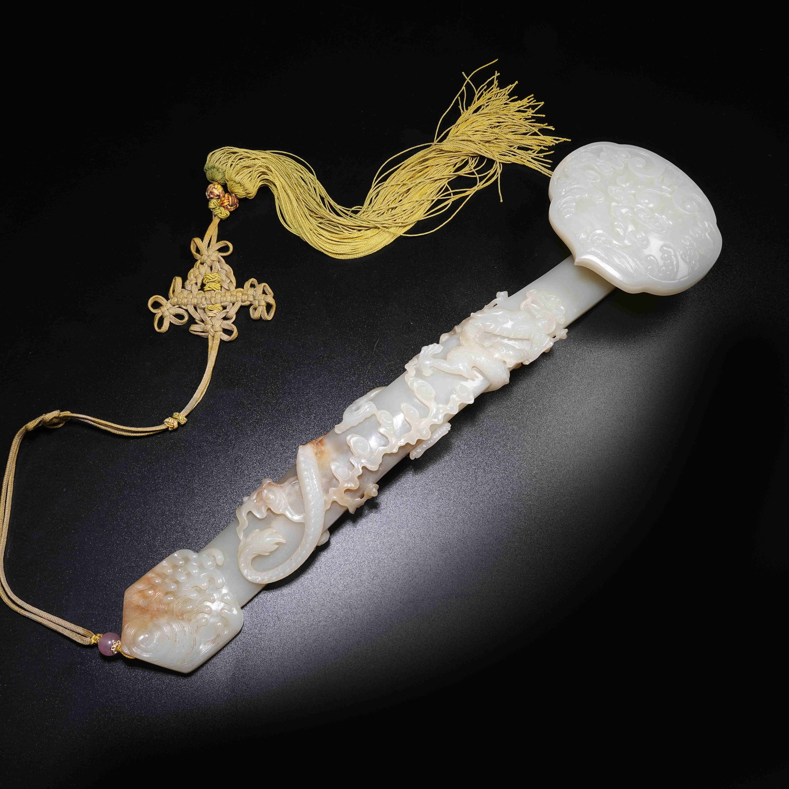 A HETIAN JADE RUYI SCEPTER WITH CLOUD-AND-DRAGON MOTIF (1 of 7)