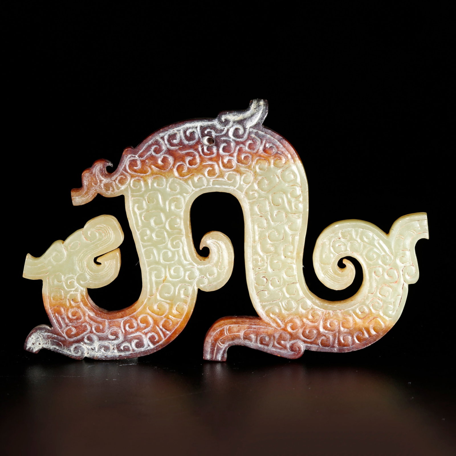 A ARCHAIC JADE CARVED PENDANT WITH DRAGON MOTIF (1 of 10)