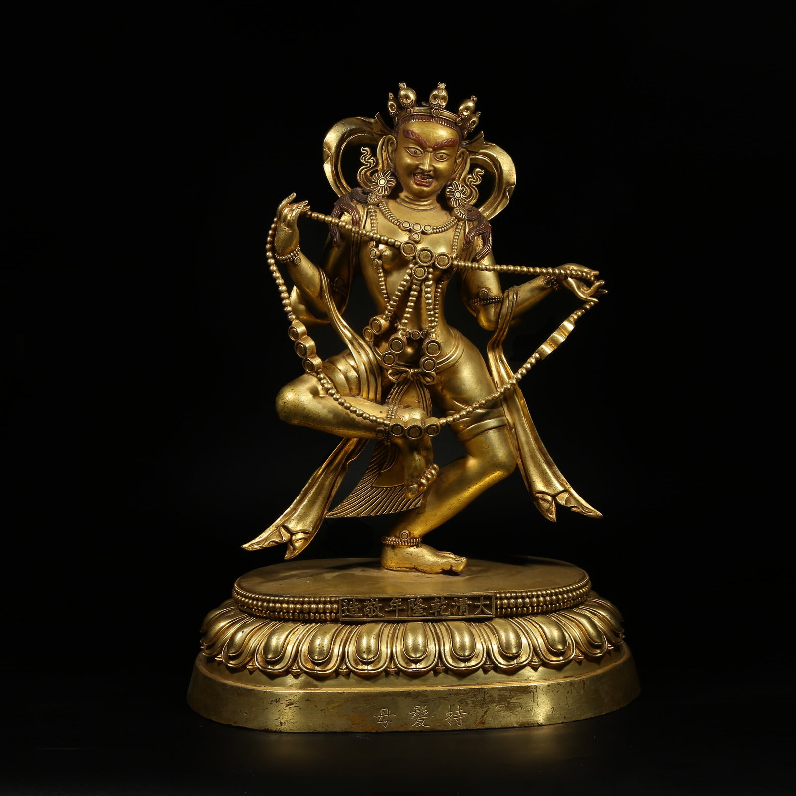 A GILT-BRONZE STATUE OF HARITI (1 of 8)