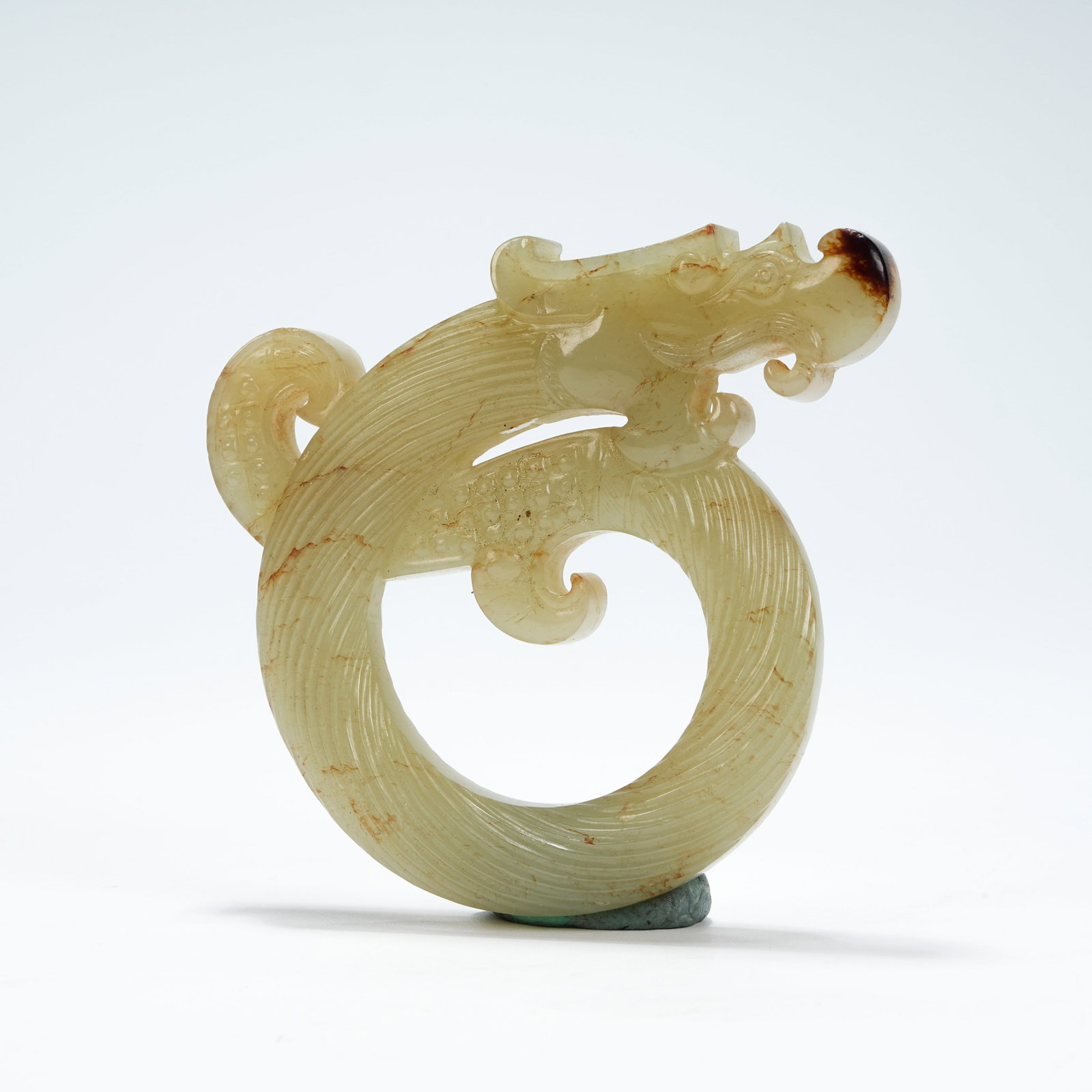 A ARCHAIC JADE OUROBOROS PENDANT (1 of 9)