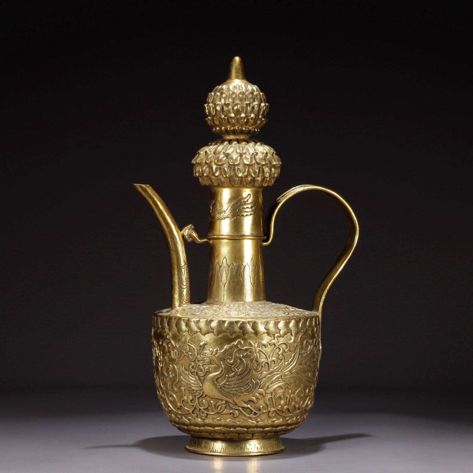 A GILDED BRONZE PHOENIX-PATTERNED TEAPOT (1 of 9)