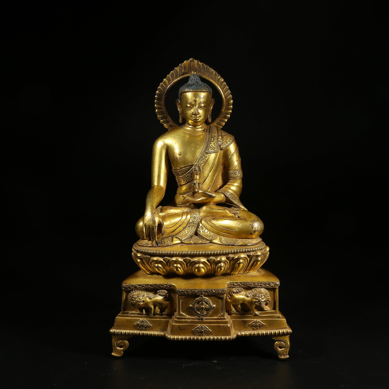 A GILT-BRONZE STATUE OF AKSHOBHYA BUDDHA (1 of 8)