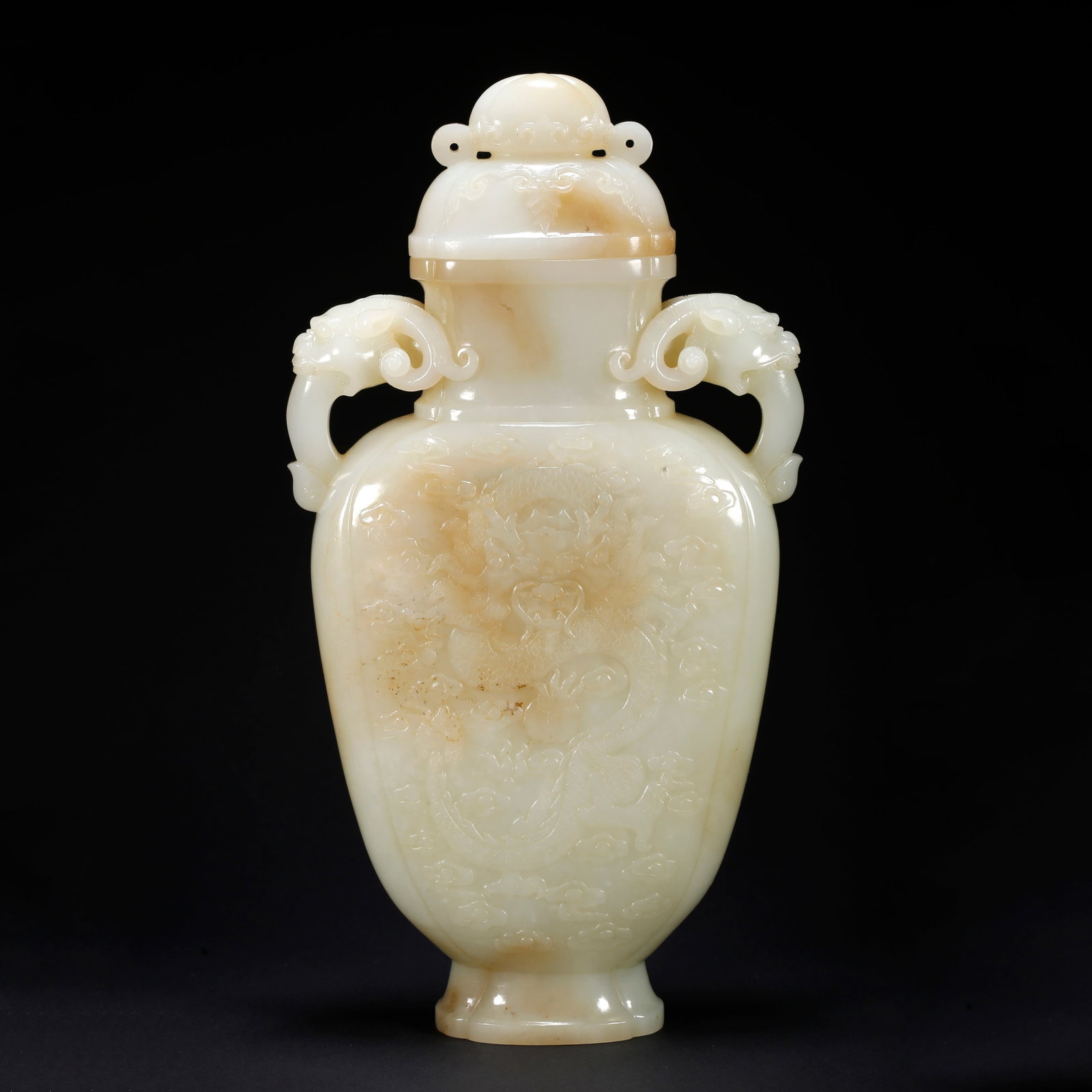 A HETIAN JADE DOUBLE-HANDLED COVERED BOTTLE WITH CLOUD AND DRAGON MOTIF (1 of 9)