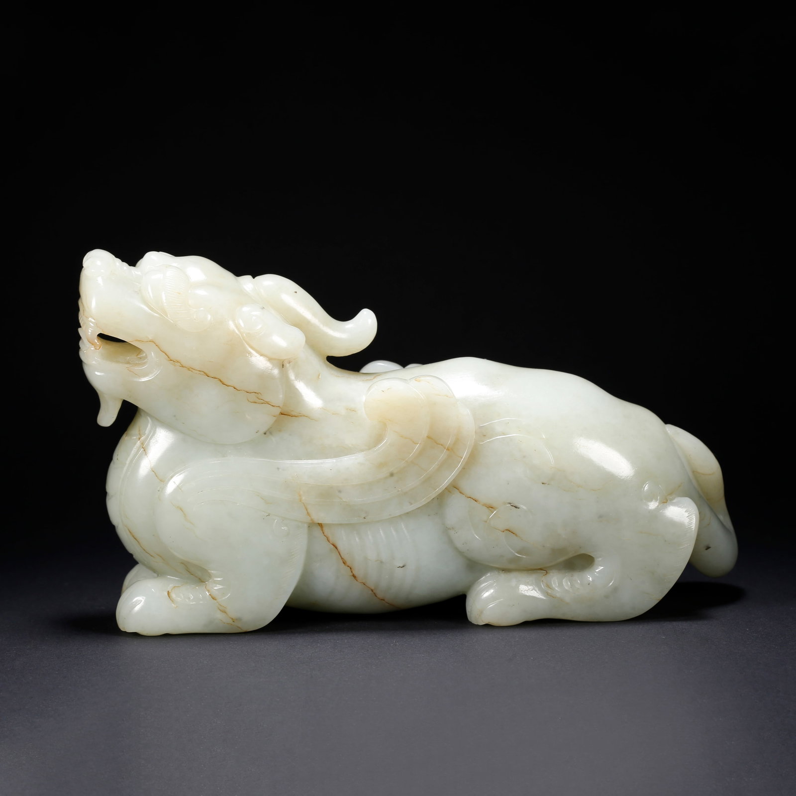 A HETIAN JADE CHI-TIGER FIGURINE (1 of 10)
