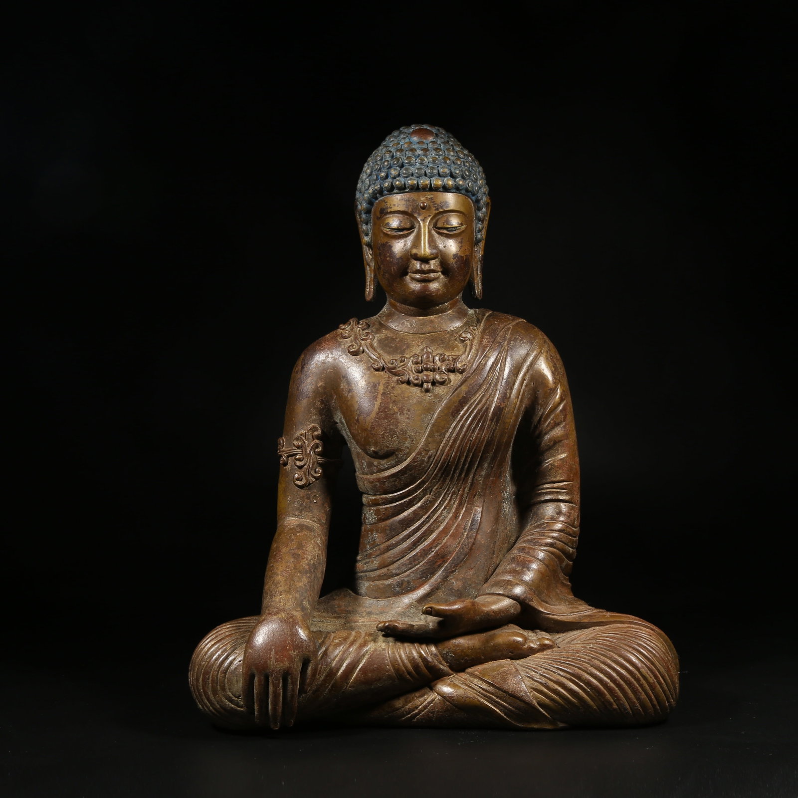 A BRONZE STATUE OF SHAKYAMUNI IN DALI STYLE (1 of 8)