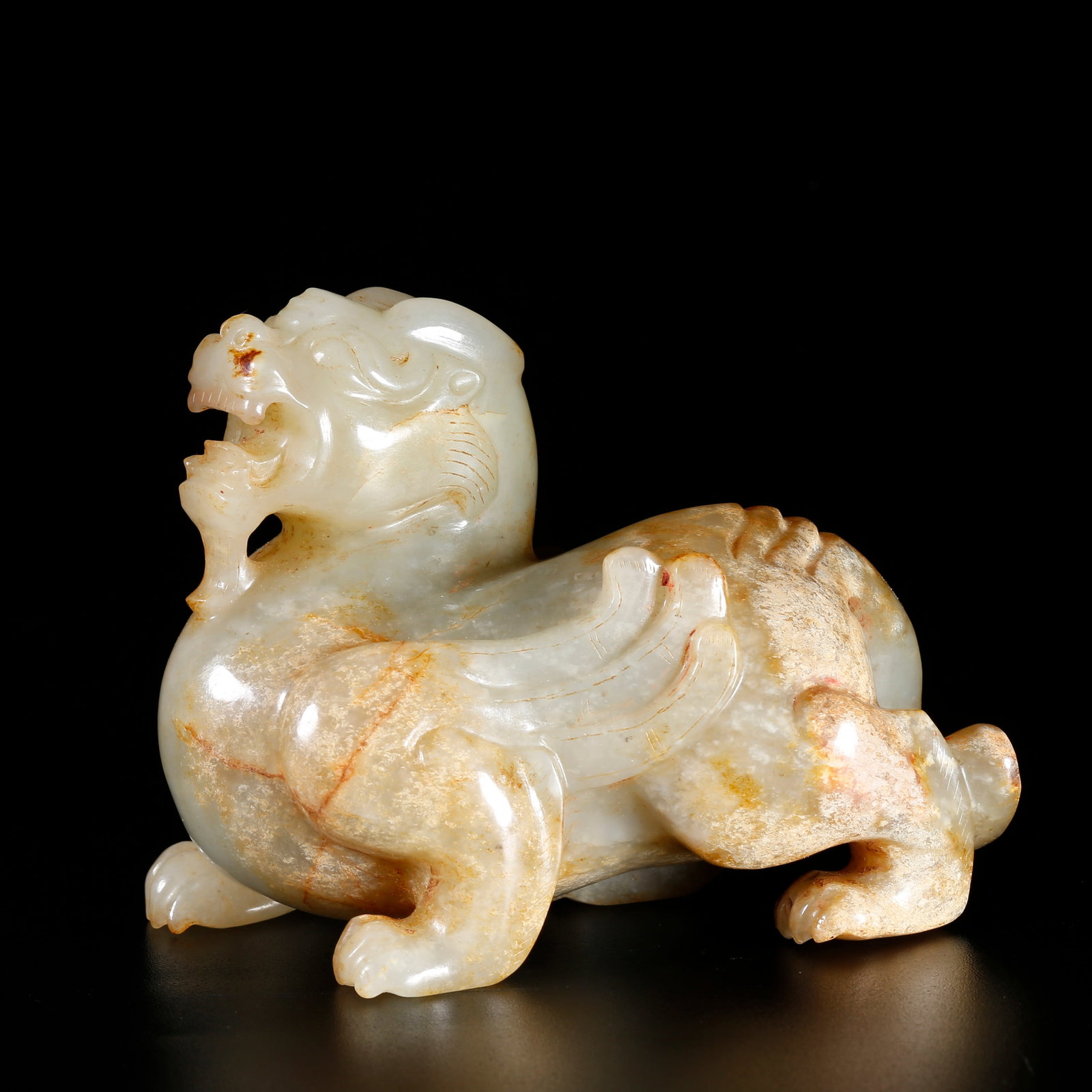 A HETIAN JADE CARVED CHILONG (HORNLESS DRAGON) AND TIGER-SHAPED ORNAMENT: Hetian jade carved chilong (hornless dragon) and tiger-shaped ornament