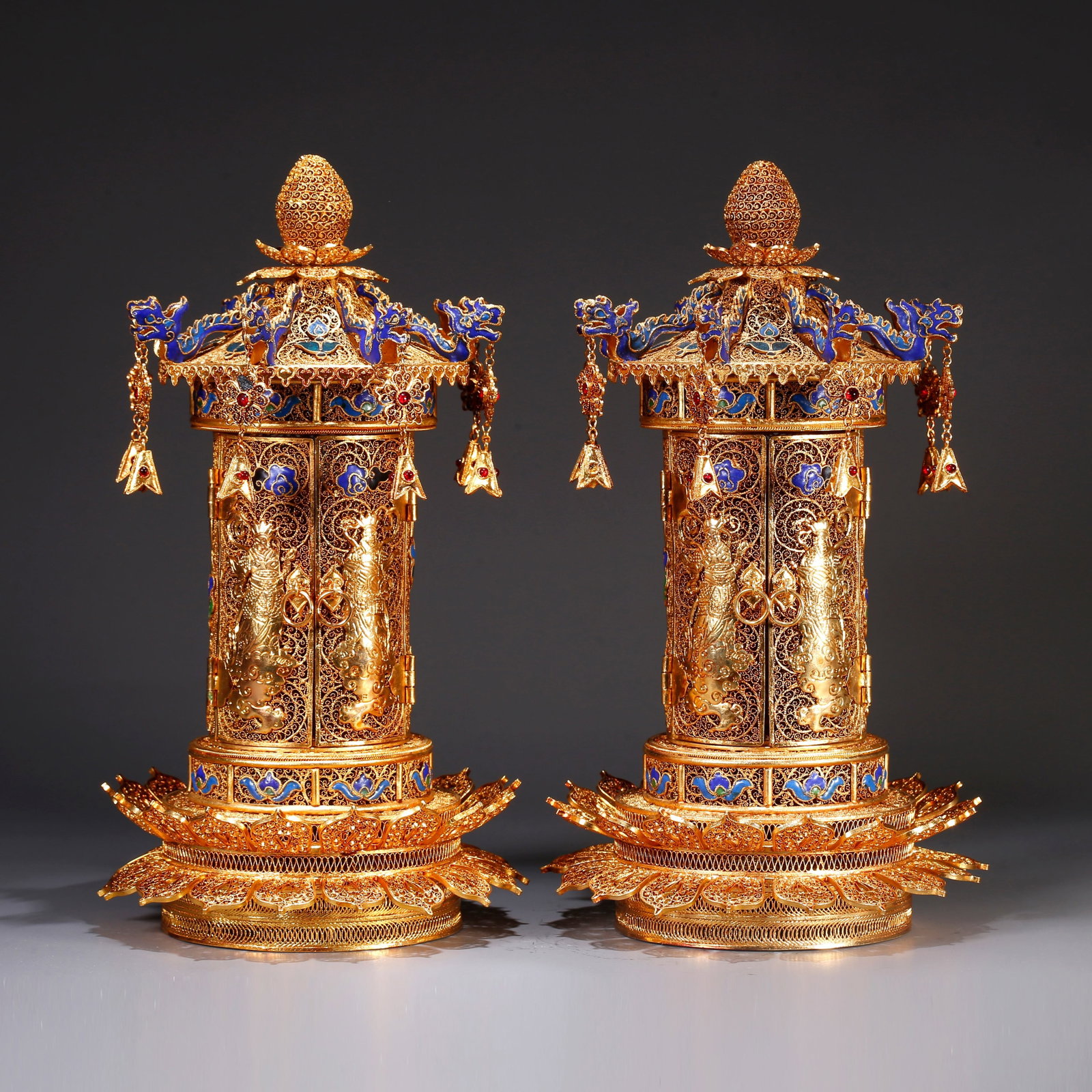 A GILT BRONZE BUDDHIST SHRINES WITH NARRATIVE SCENES (PAIR) (1 of 11)