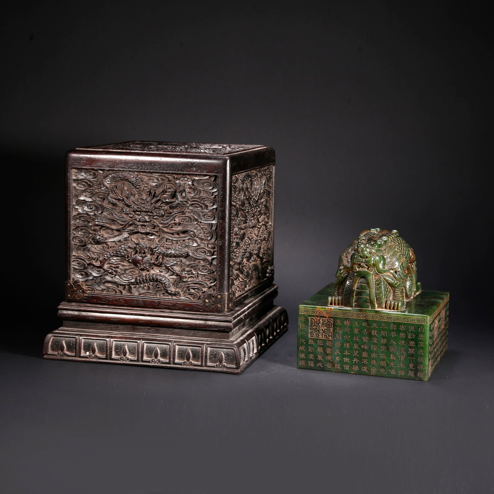 A HETIAN BIYU DOUBLE-DRAGON SEAL WITH GILDED INSCRIPTION (1 of 10)