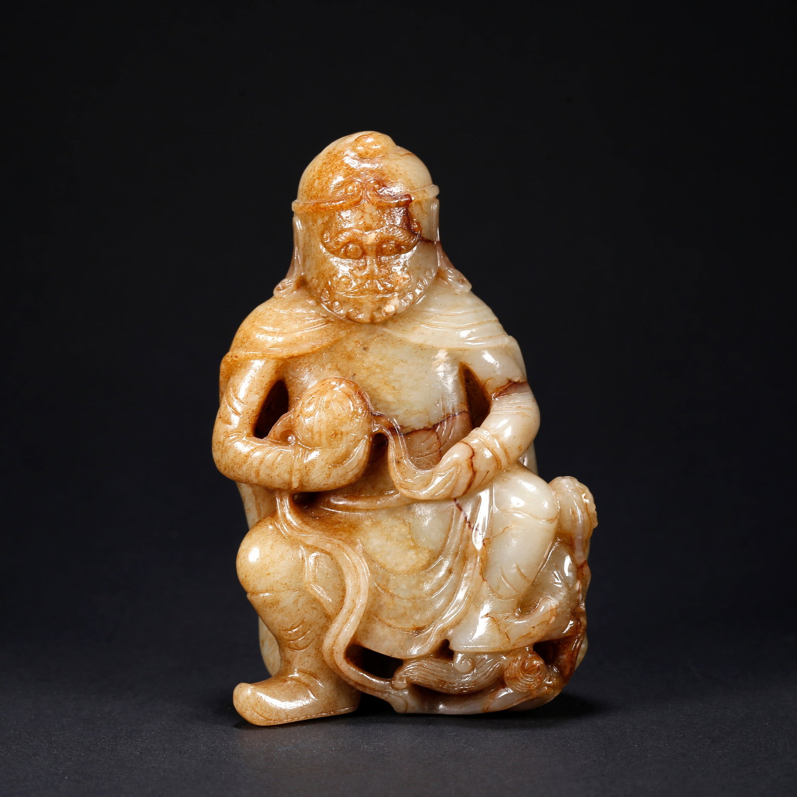 A HETIAN JADE FIGURINE (1 of 9)