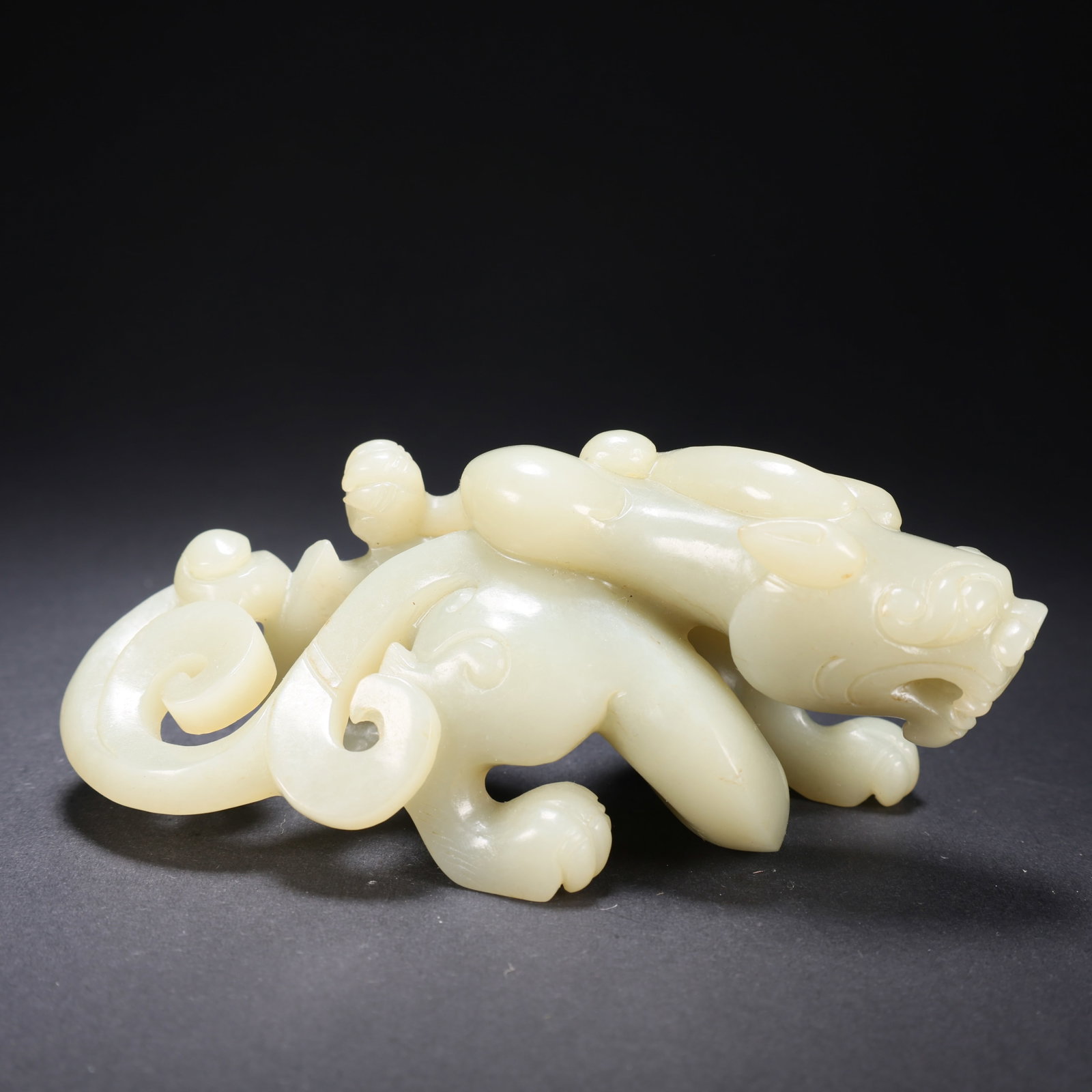 A HETIAN JADE AUSPICIOUS BEAST (1 of 9)